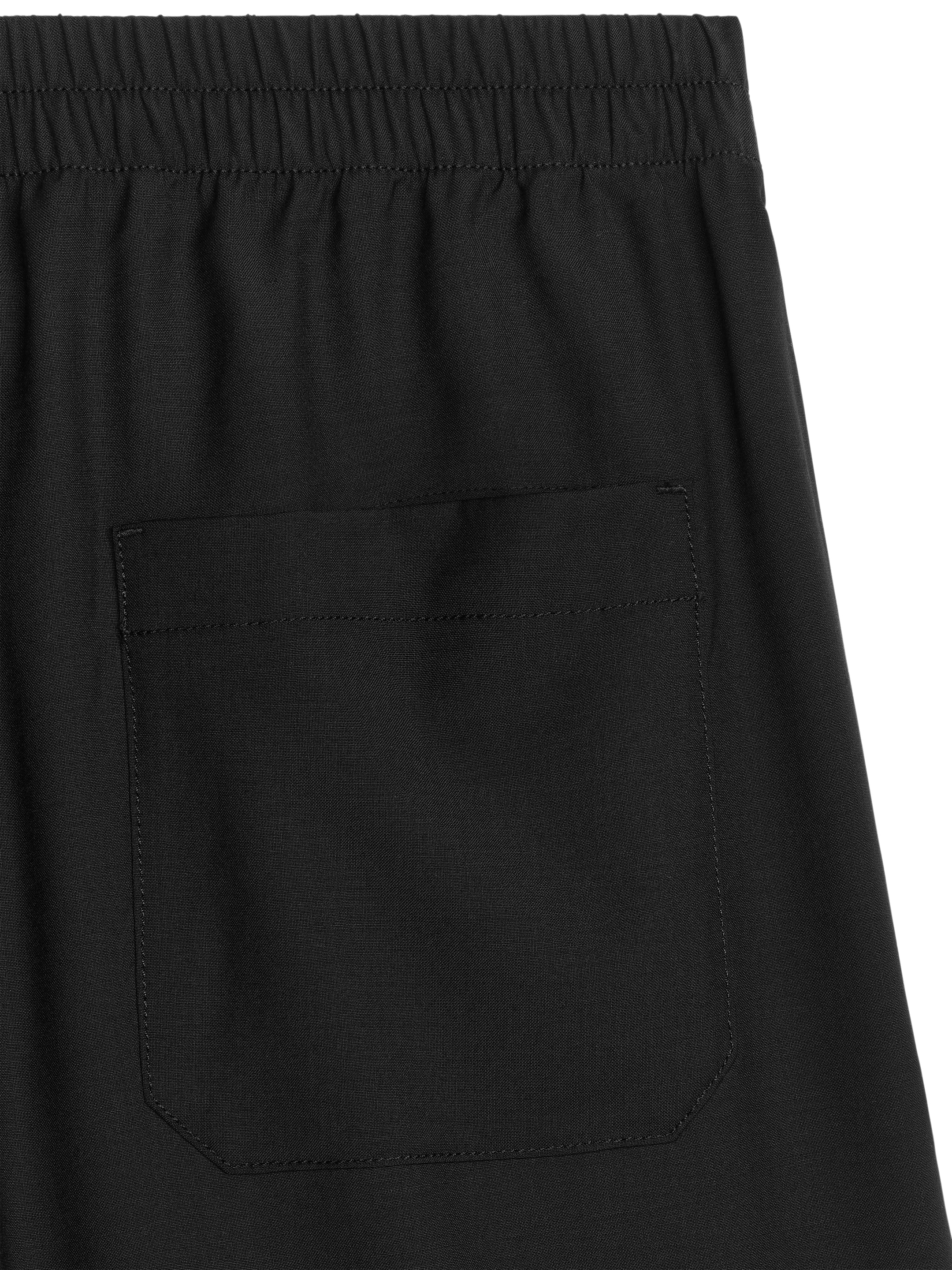 Wide Wool Trousers - Black - Loose fit - Men - StillMedia/DescriptiveDetail - 2