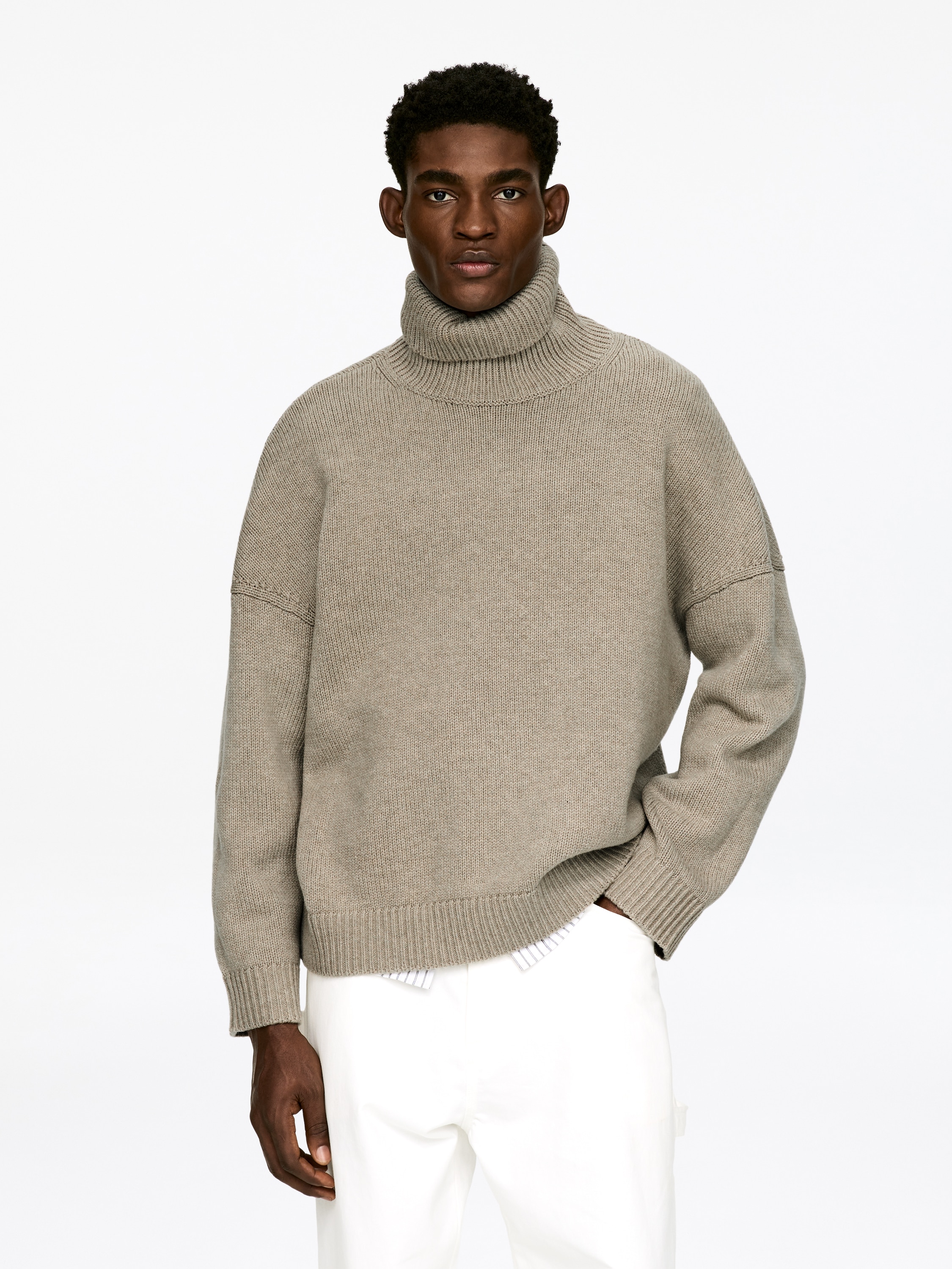 Rollkragenpullover aus Wolle - Beige