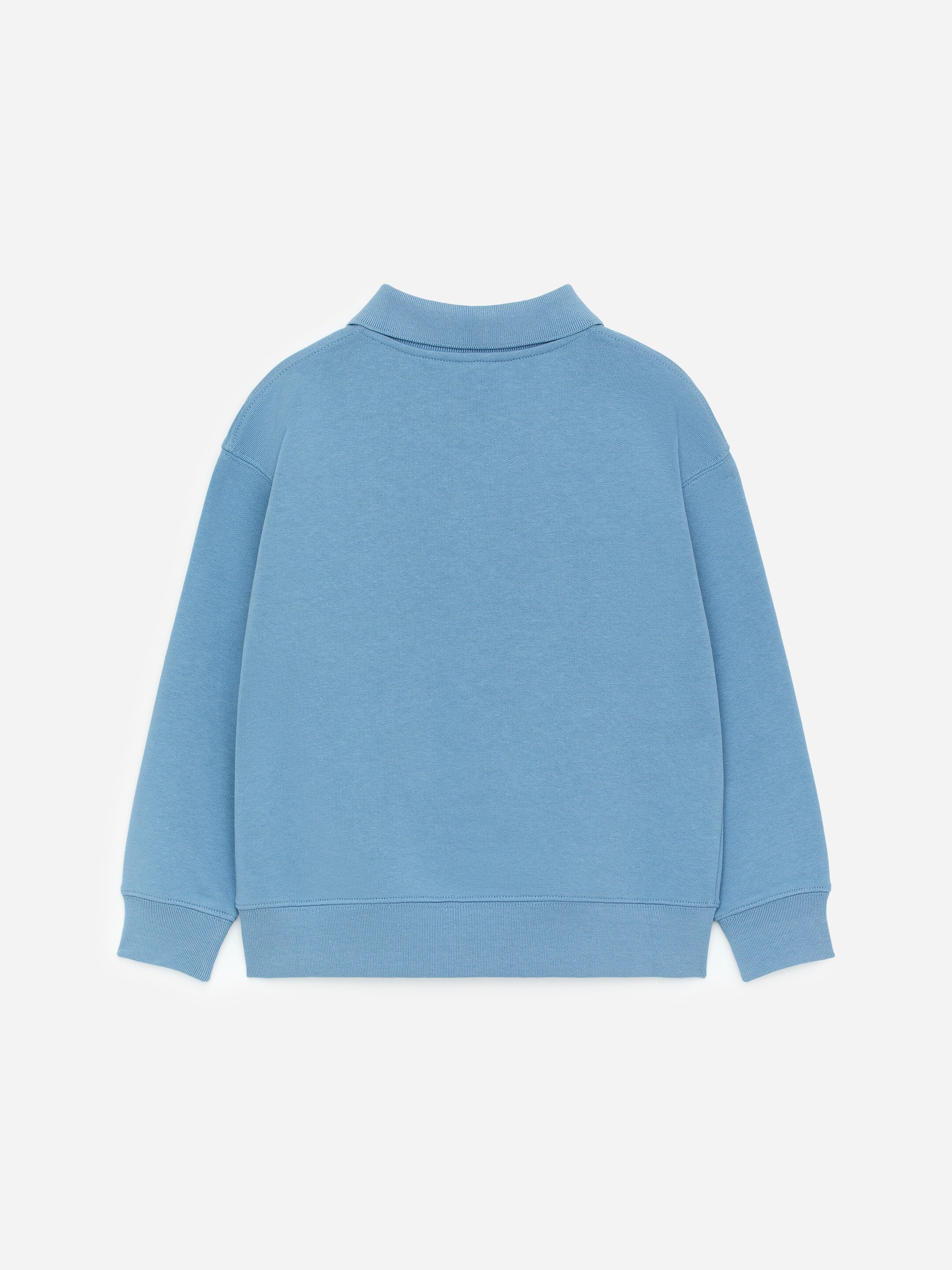 Agrandir l'image: Un sweat-shirt bleu est présenté de dos, avec un col côtelé, des manches longues, ainsi que des poignets et un ourlet côtelés.