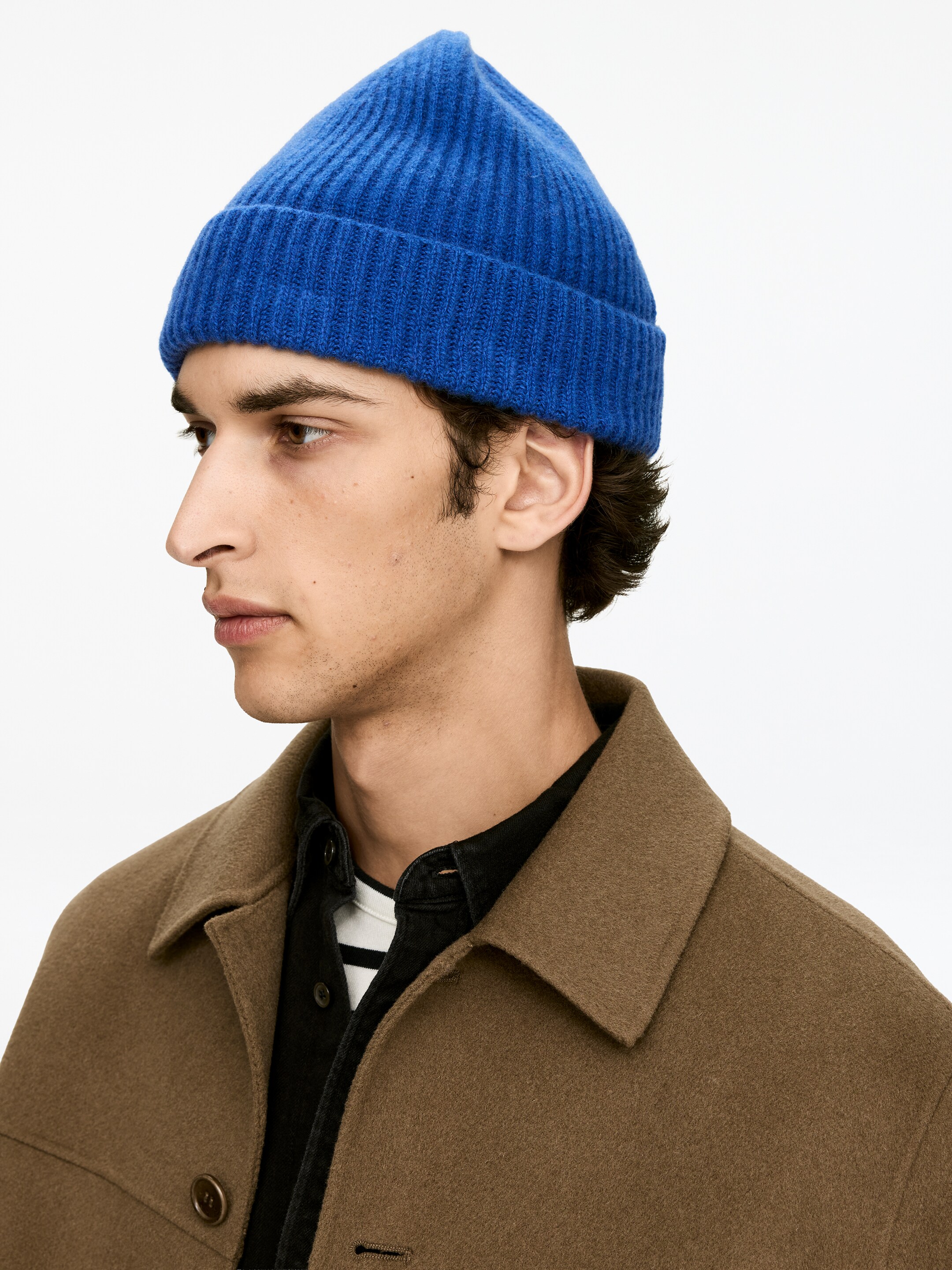 Visualizza immagine più grande: Berretto in misto lana con lavorazione a coste - Blu - UOMO | H&M IT 1