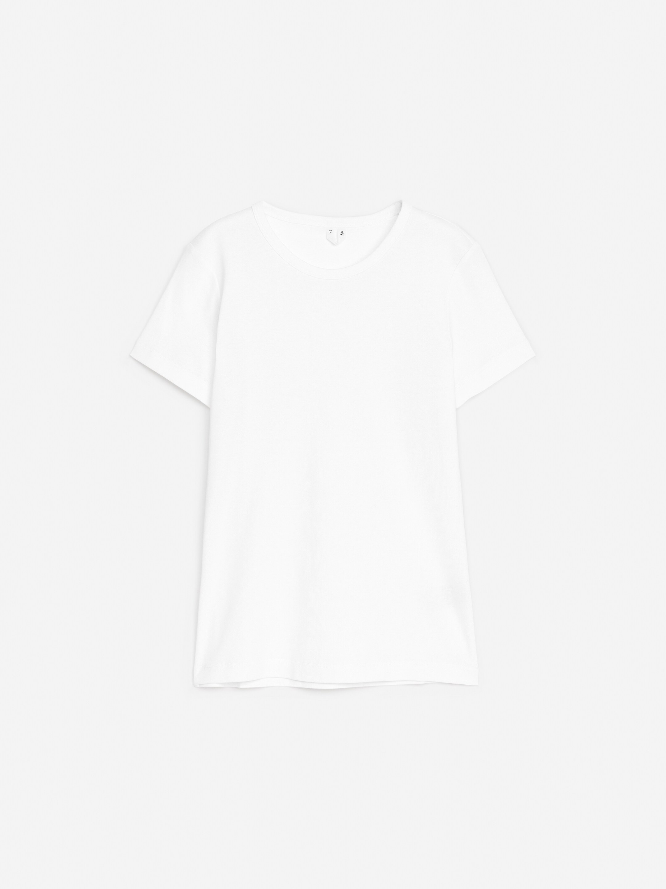 Visa större bild: T-shirt med figurnära passform - Vit - DAM | H&M SE 1