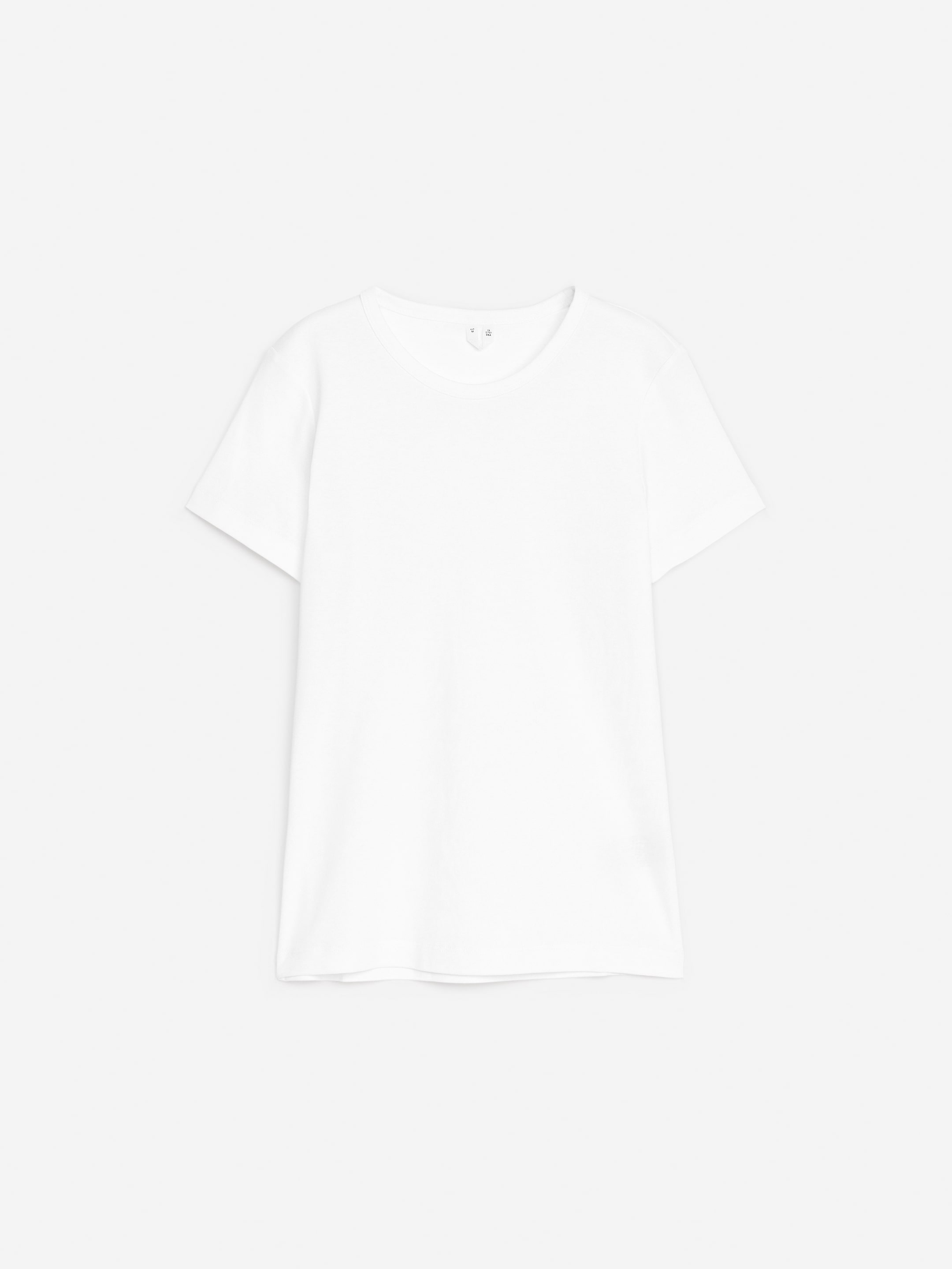 Visa större bild: T-shirt med figurnära passform - Vit - DAM | H&M SE 1