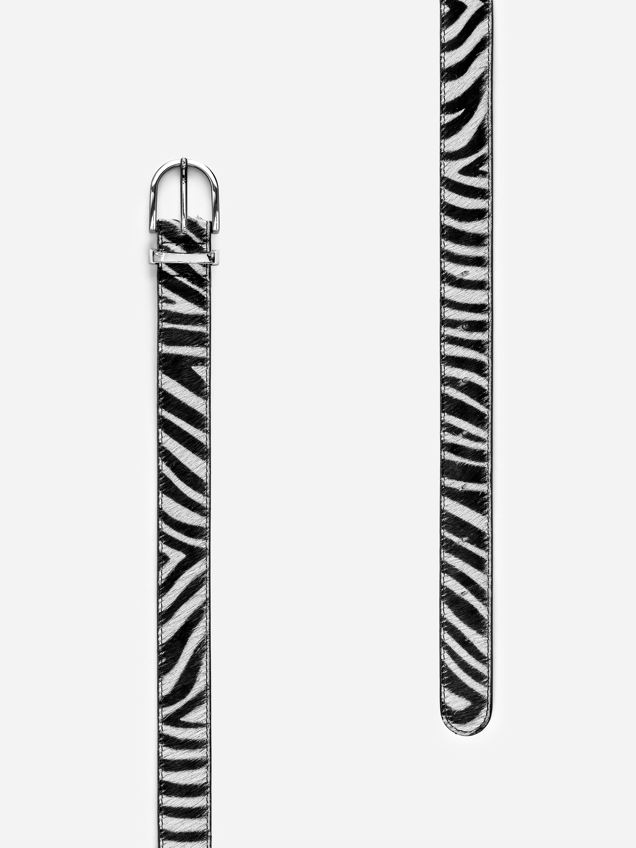 Näytä suurempi kuva: Seeprakuvioitu nahkavyö - Valkoinen/musta - NAISET | H&M FI 2