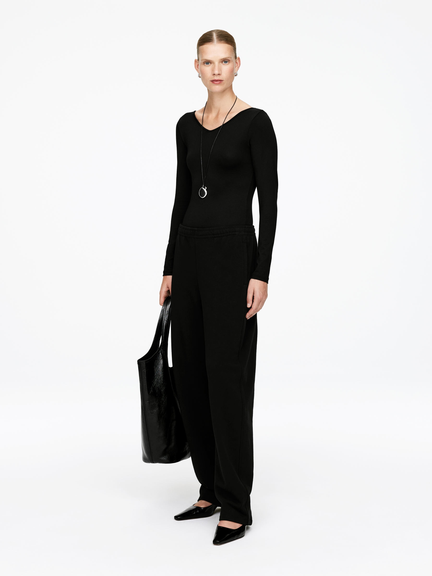 Pantalones de chándal con pernera de barril - Negro - Corte relajado - Women - StillMedia/Lookbook - 6