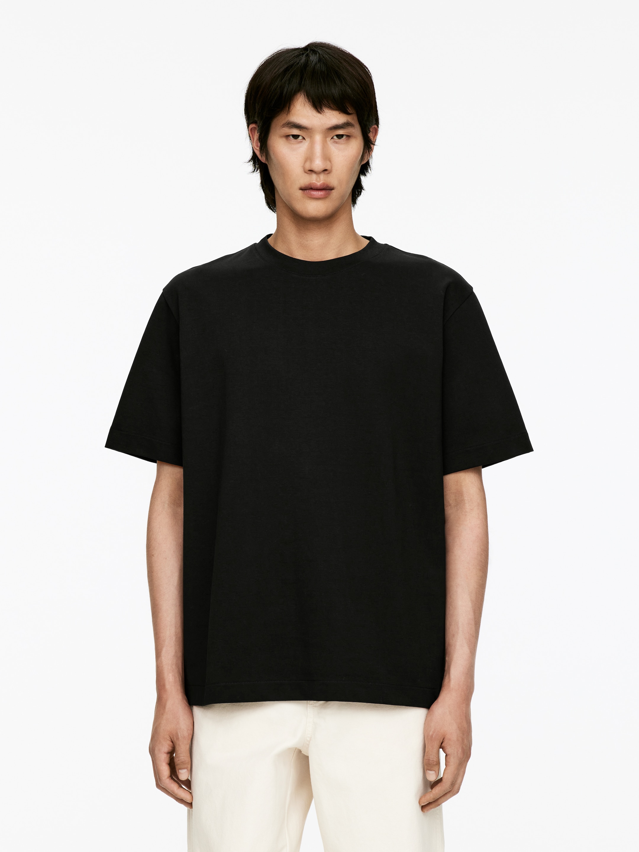 Se større billede: T-shirt i interlock-stof - Sort - HERRE | H&M DK 1