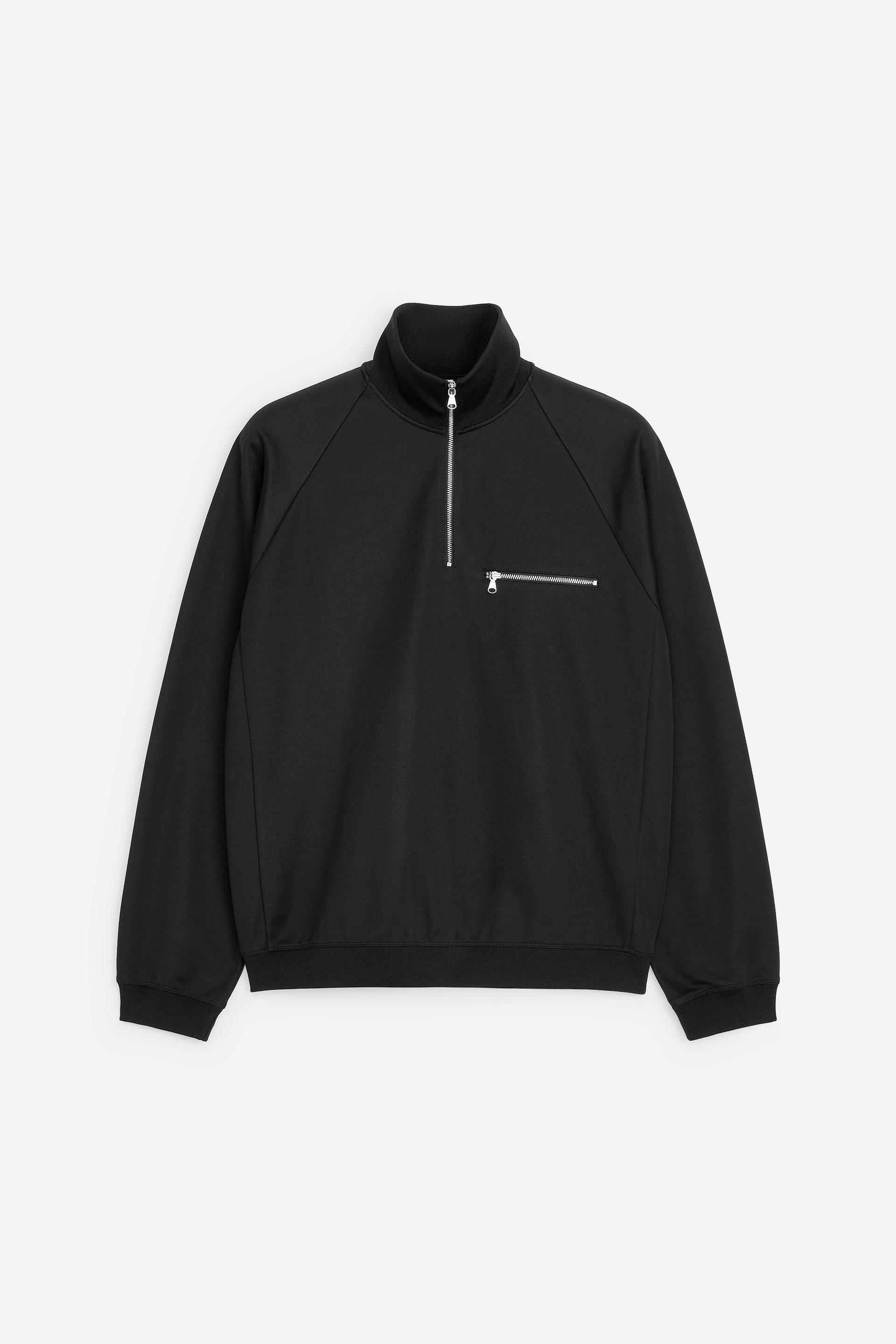 View larger image: A black quarter-zip sweatshirt is facing front, featuring a high collar with a silver-toned quarter-zip fastening and a horizontal zippered pocket on the left chest. It showcases raglan sleeves, ribbed cuffs, and a ribbed hem.