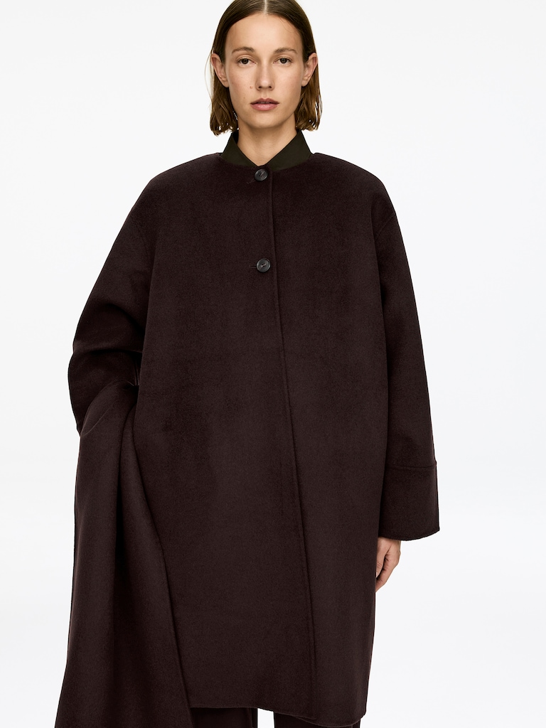 Manteau cape en laine doublée