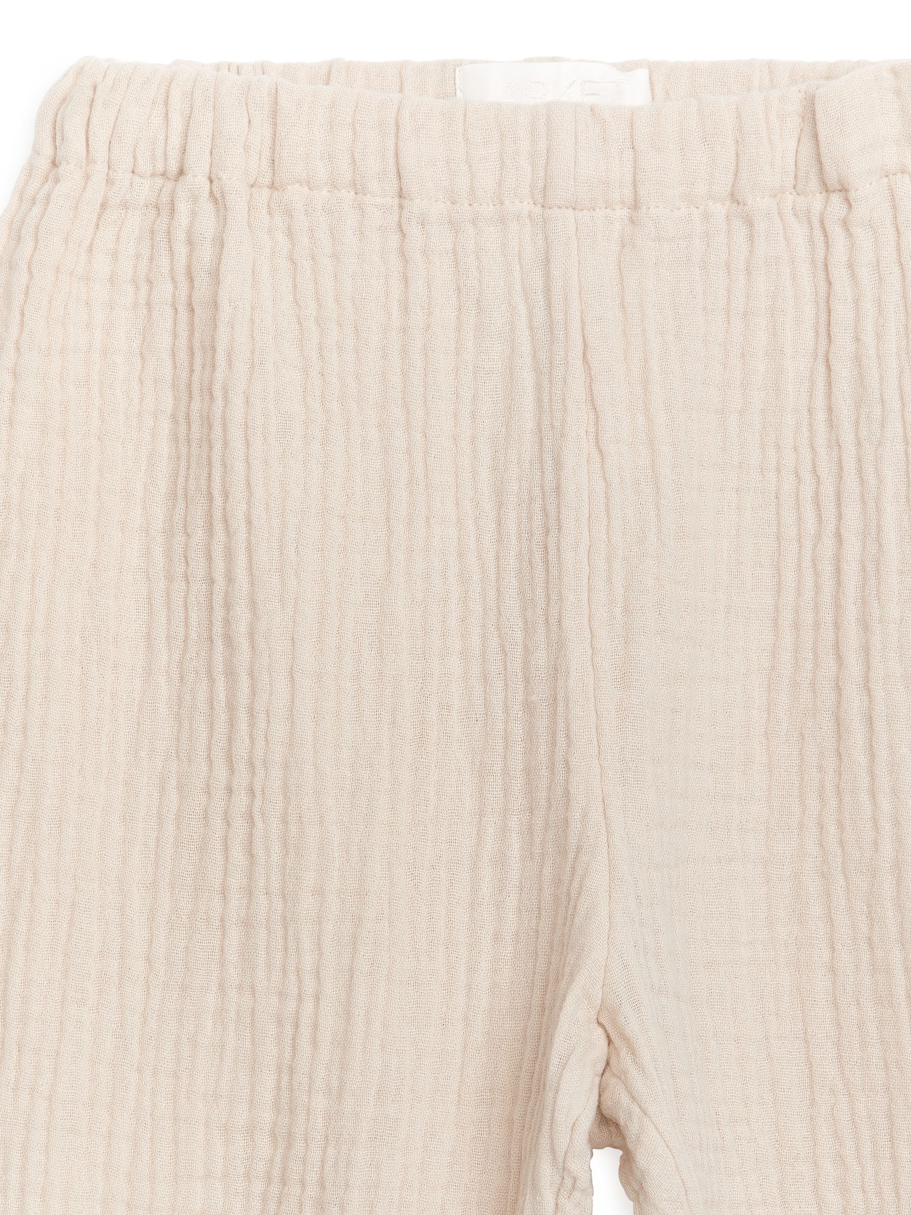 Pantalones con estampado por toda la prenda - Blanco roto - Corte relajado - Children - StillMedia/DescriptiveDetail - 1