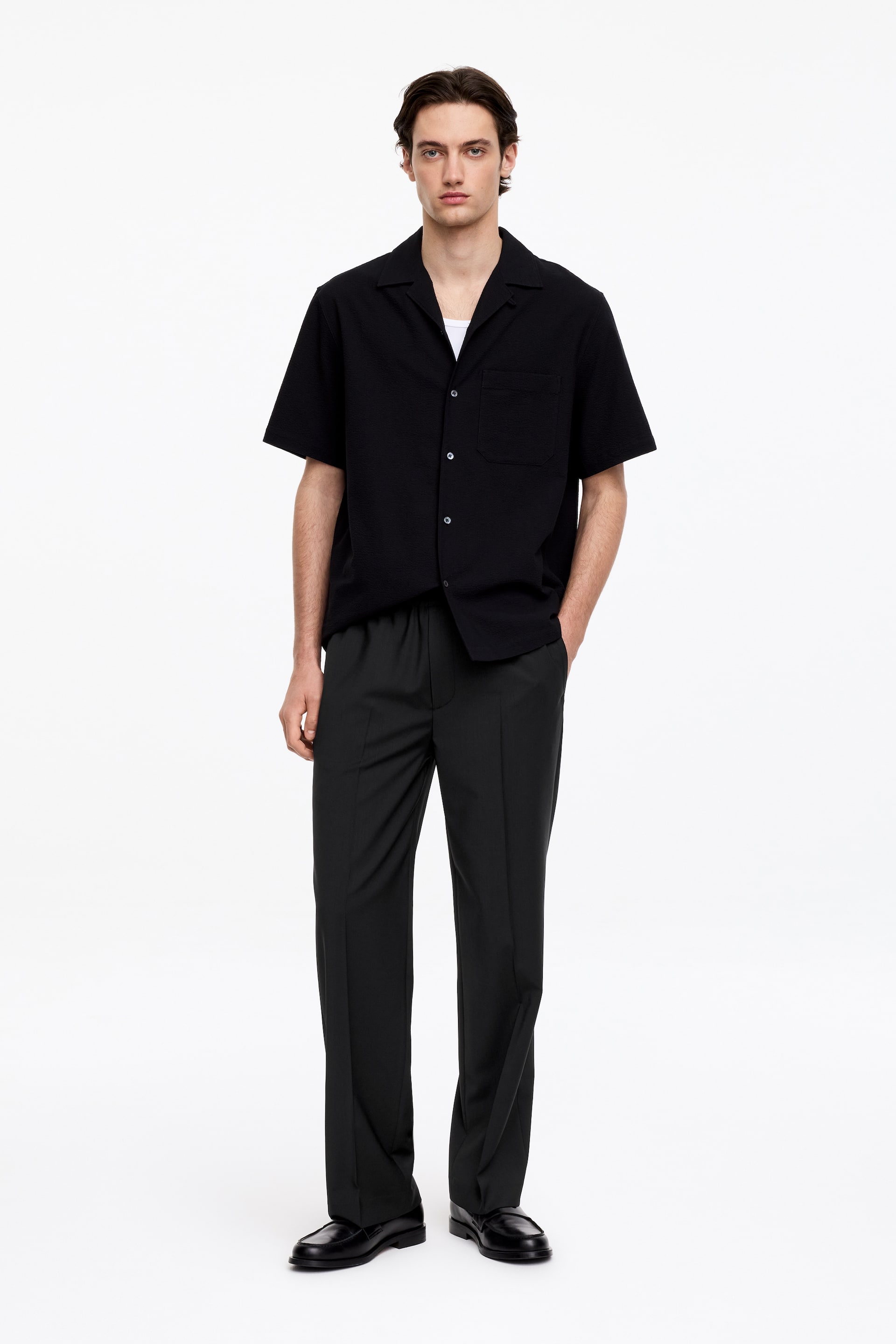 Visa större bild: Vida byxor med dragsko - Svart - HERR | H&M SE 1