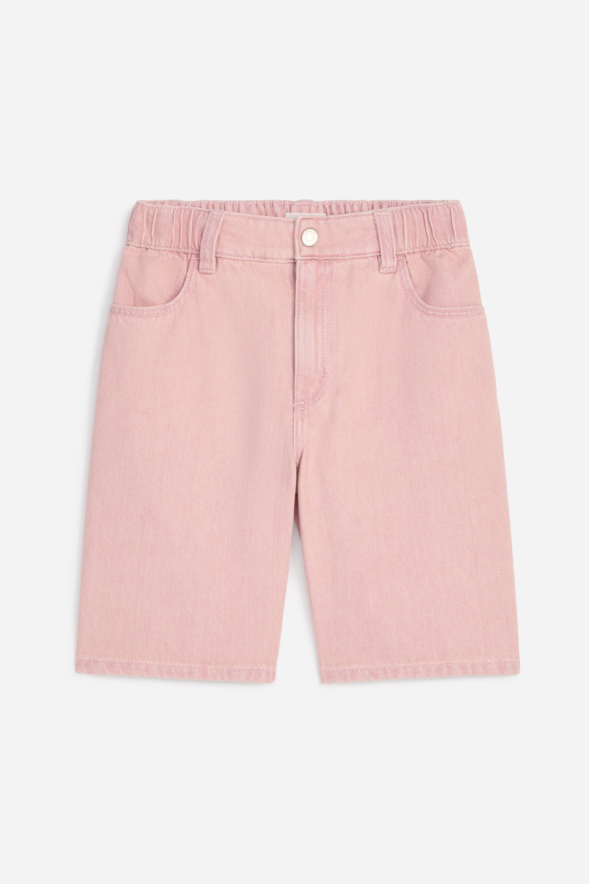 View larger image: A pair of pink shorts is facing front, featuring an elasticated waistband with belt loops, a single button fastening, and a zip fly. Two curved front pockets are visible, and the shorts extend to knee-length with a stitched hem.