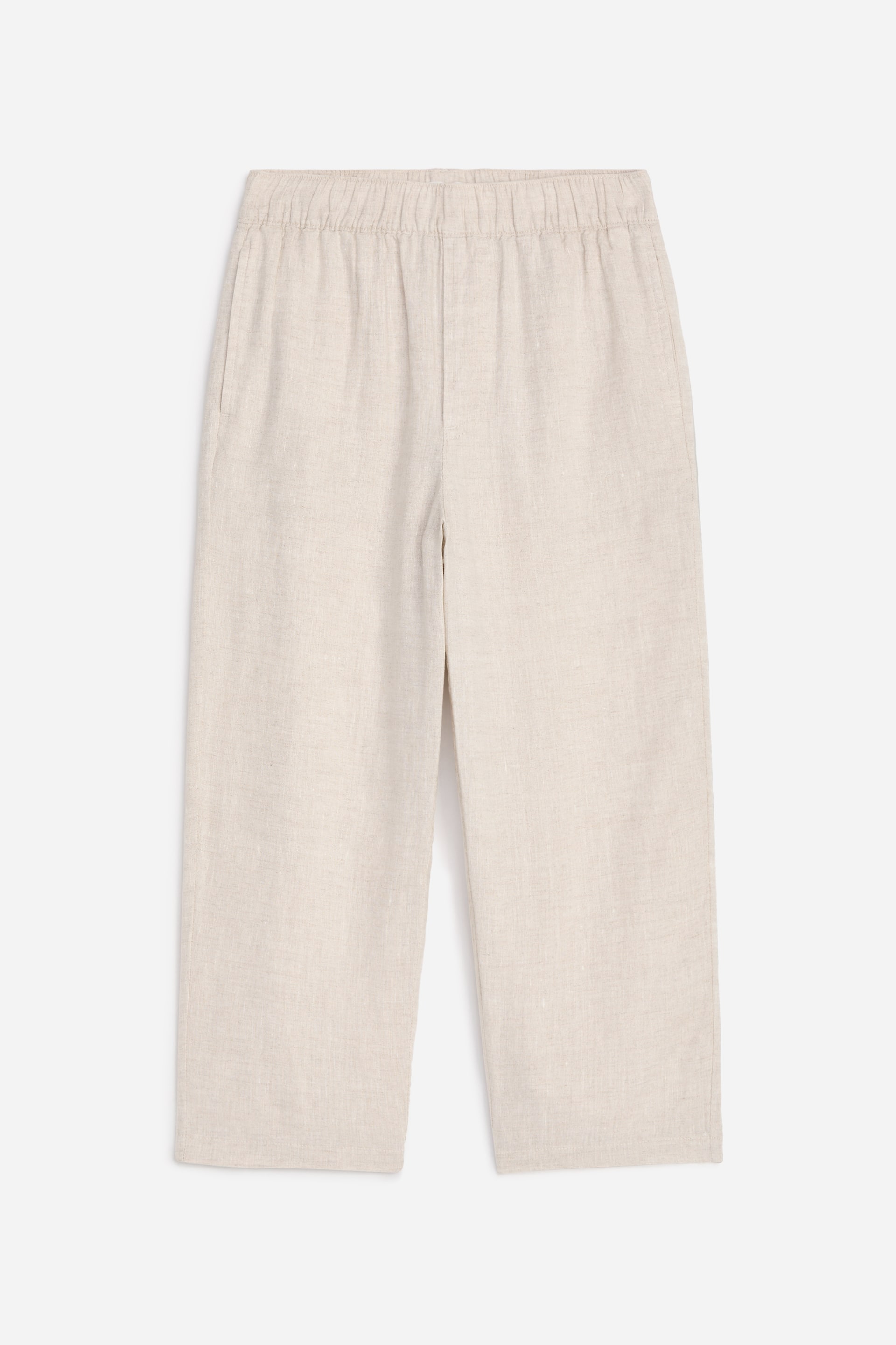 Größeres Bild ansehen: Eine Hose aus einem leichten Leinen-Mischgewebe in Beige wird von vorne gezeigt, mit einem gerafften elastischen Bund. Die Hose präsentiert sich in einer entspannten, gerade geschnittenen Passform mit sichtbaren Seitentaschen.