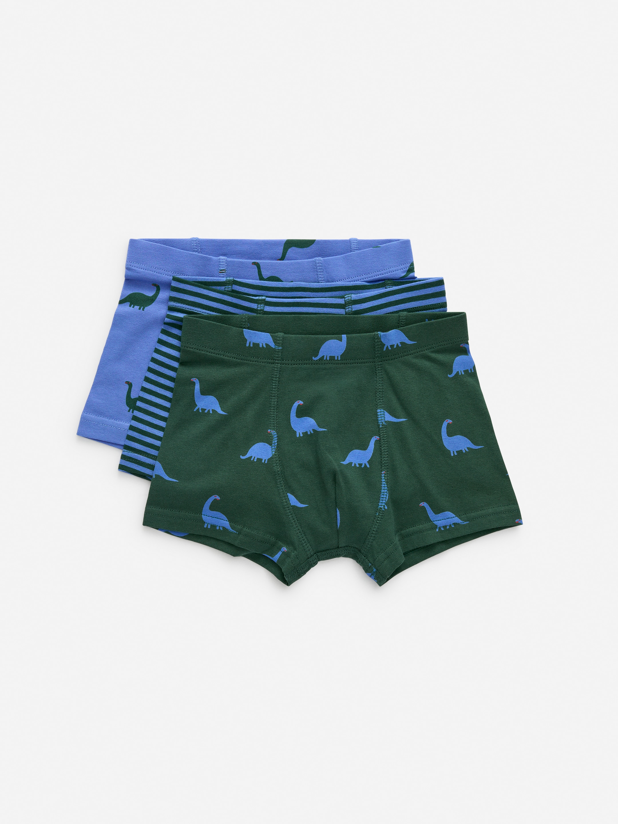 Ver imagen más grande: Tres pares de calzoncillos clásicos de algodón de jersey simple están apilados, cada uno presentado como FRONT, con cinturillas elásticas y frentes forrados. El par superior es verde oscuro con estampados de dinosaurios en azul claro, el par del medio es azul con rayas horizontales, y el par inferior es azul claro con estampados de dinosaurios en verde oscuro.