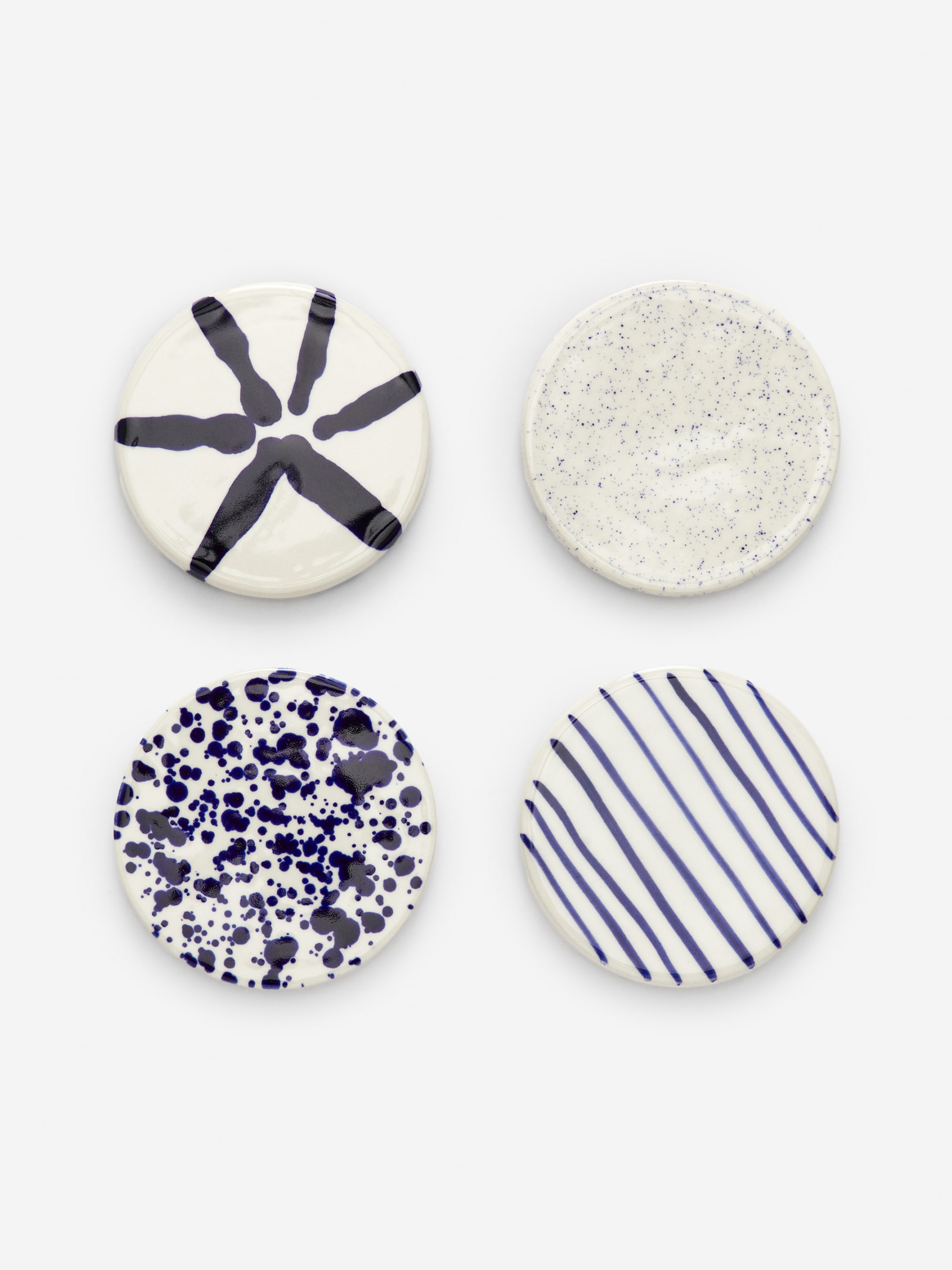 Größeres Bild anzeigen: Untersetzer aus Steingut, 4er-Set - Cremeweiß/Blau - Home All | H&M AT 1