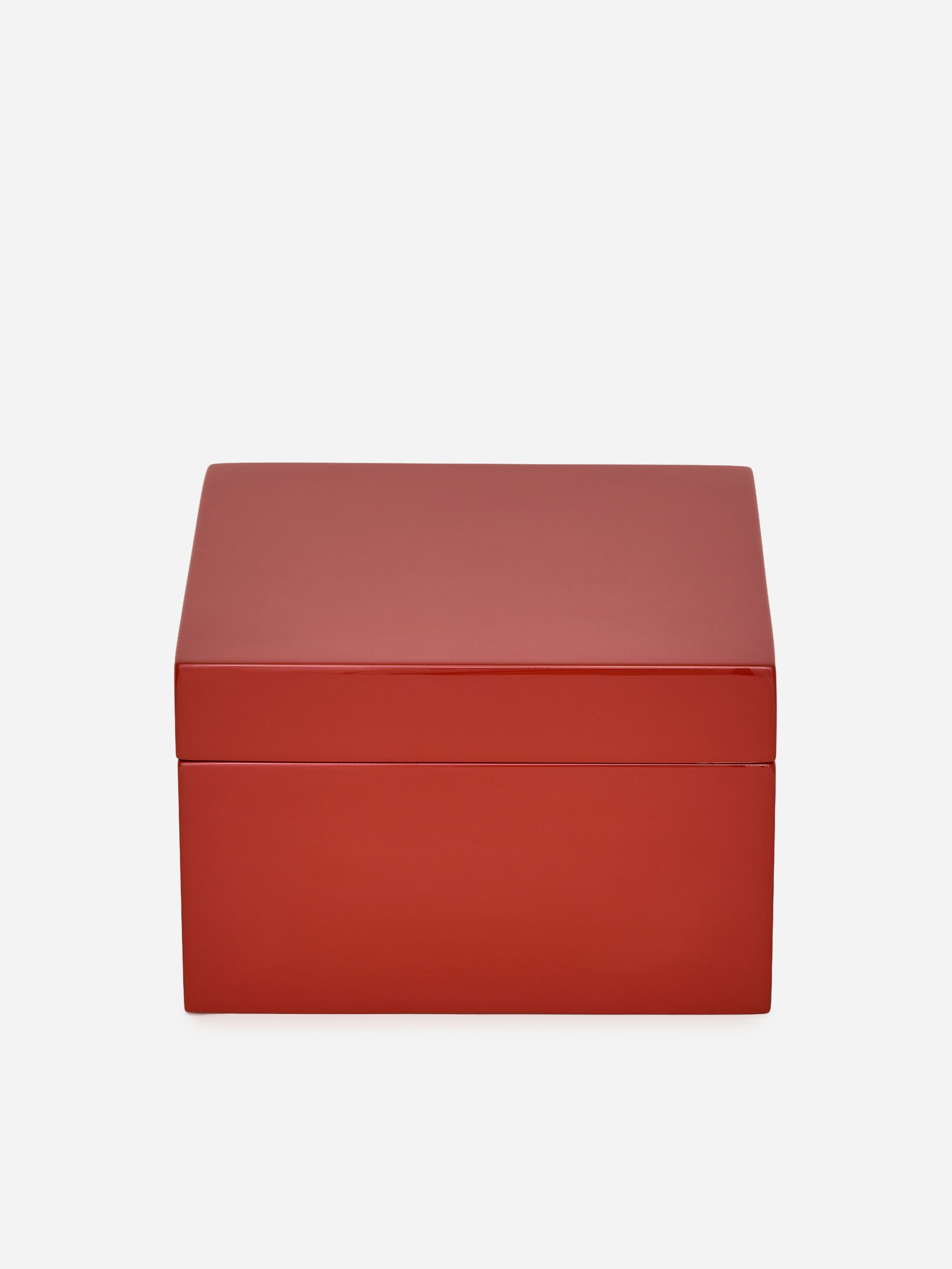 View larger image: A squared red box with a lid is showcasing a high-gloss lacquered finish from the front.