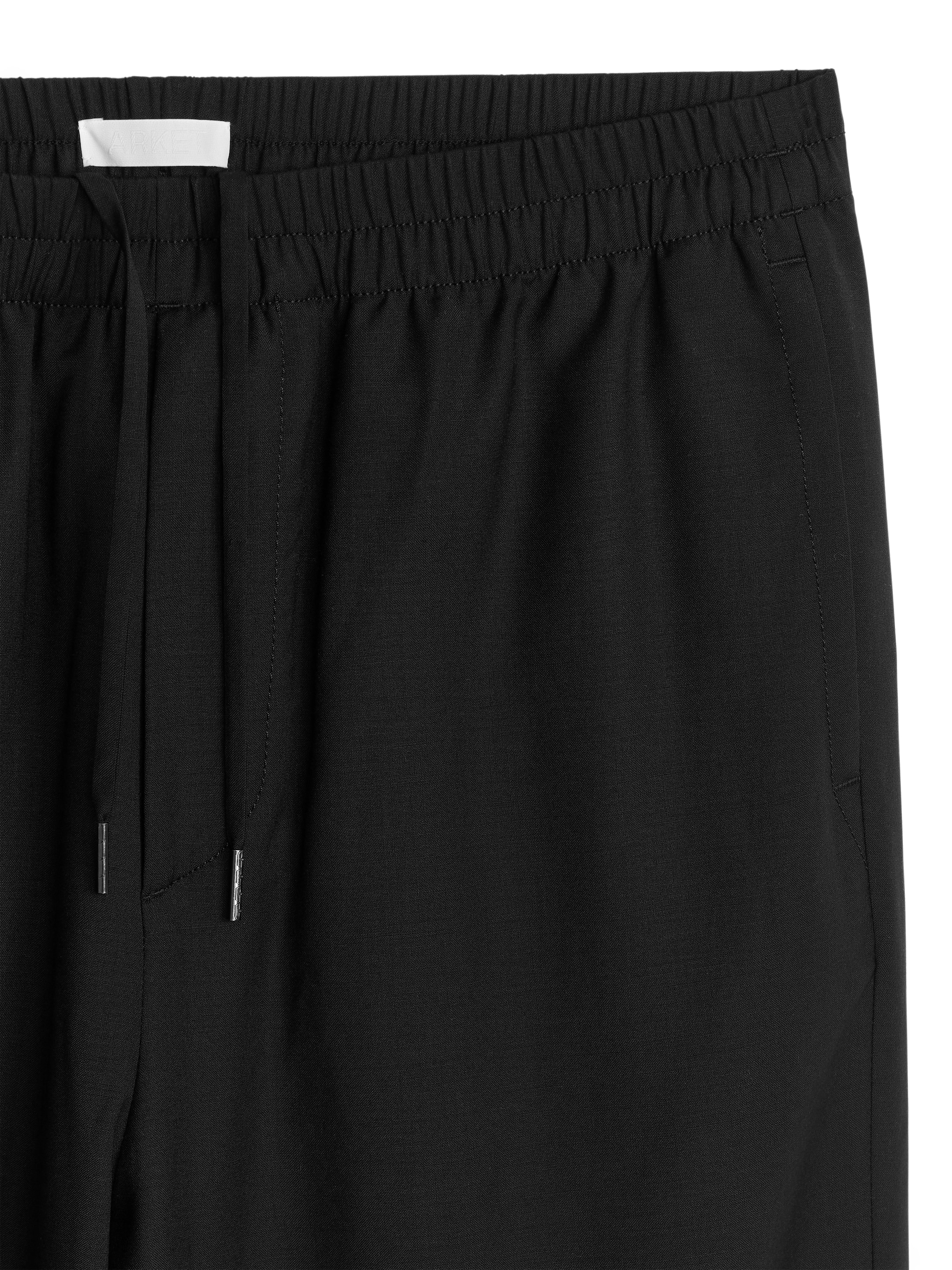 Wide Wool Trousers - Black - Loose fit - Men - StillMedia/DescriptiveDetail - 3