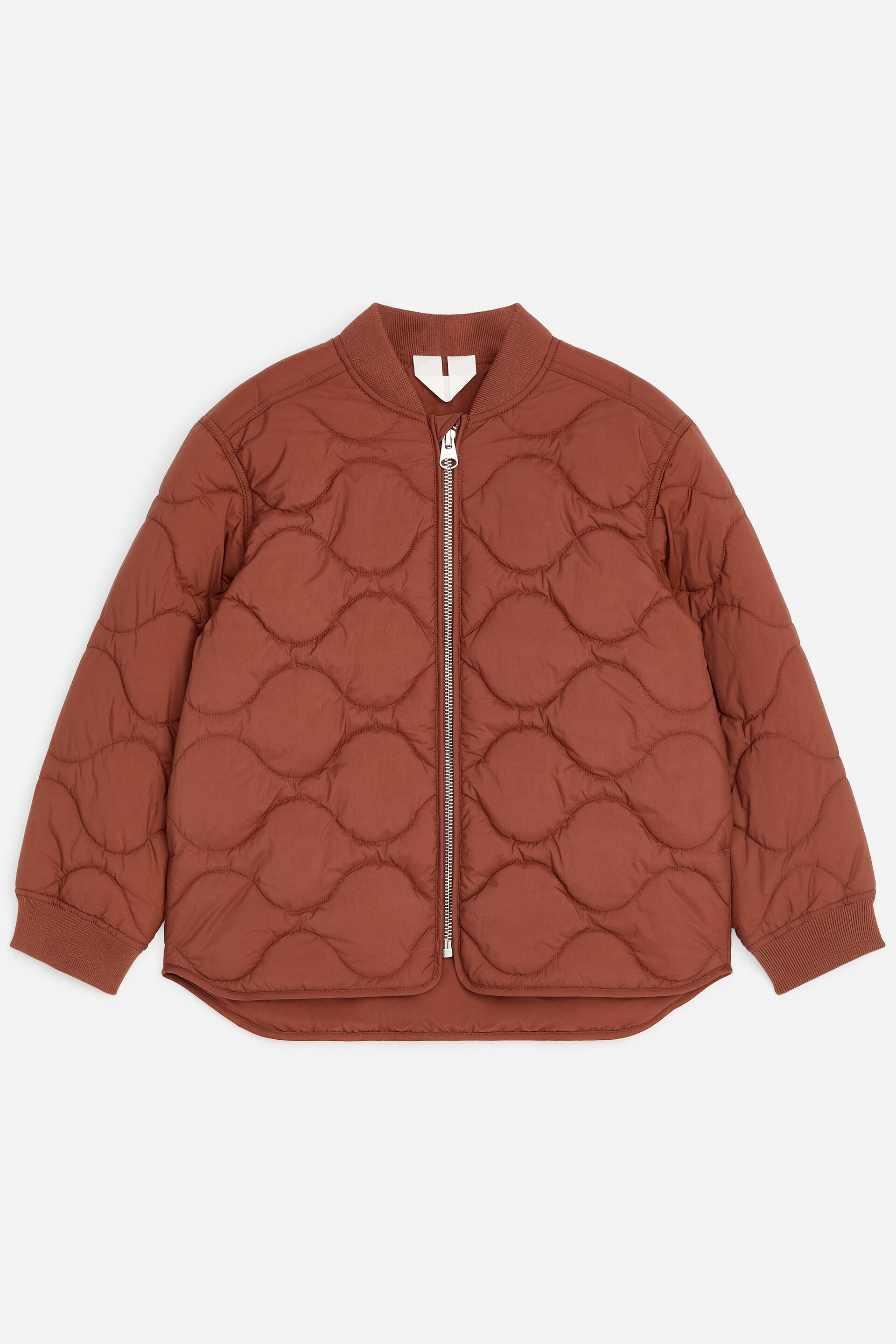View larger image: A brown bomber jacket is showcasing its front, featuring a full-length silver zip and a wavy quilted pattern. It is designed with a ribbed collar, ribbed cuffs, and a curved hemline.