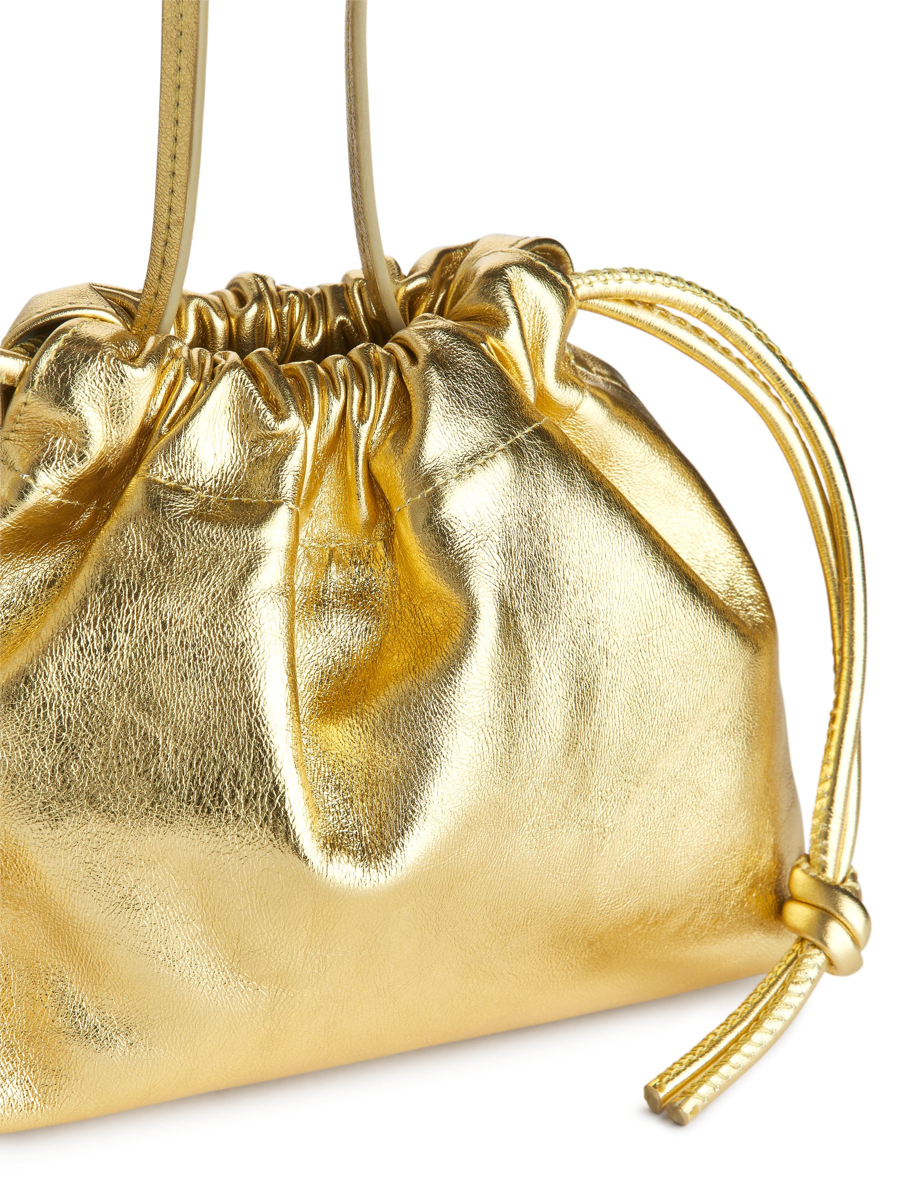 Läderväska med dragsko - Guld - Women - StillMedia/DescriptiveDetail - 1