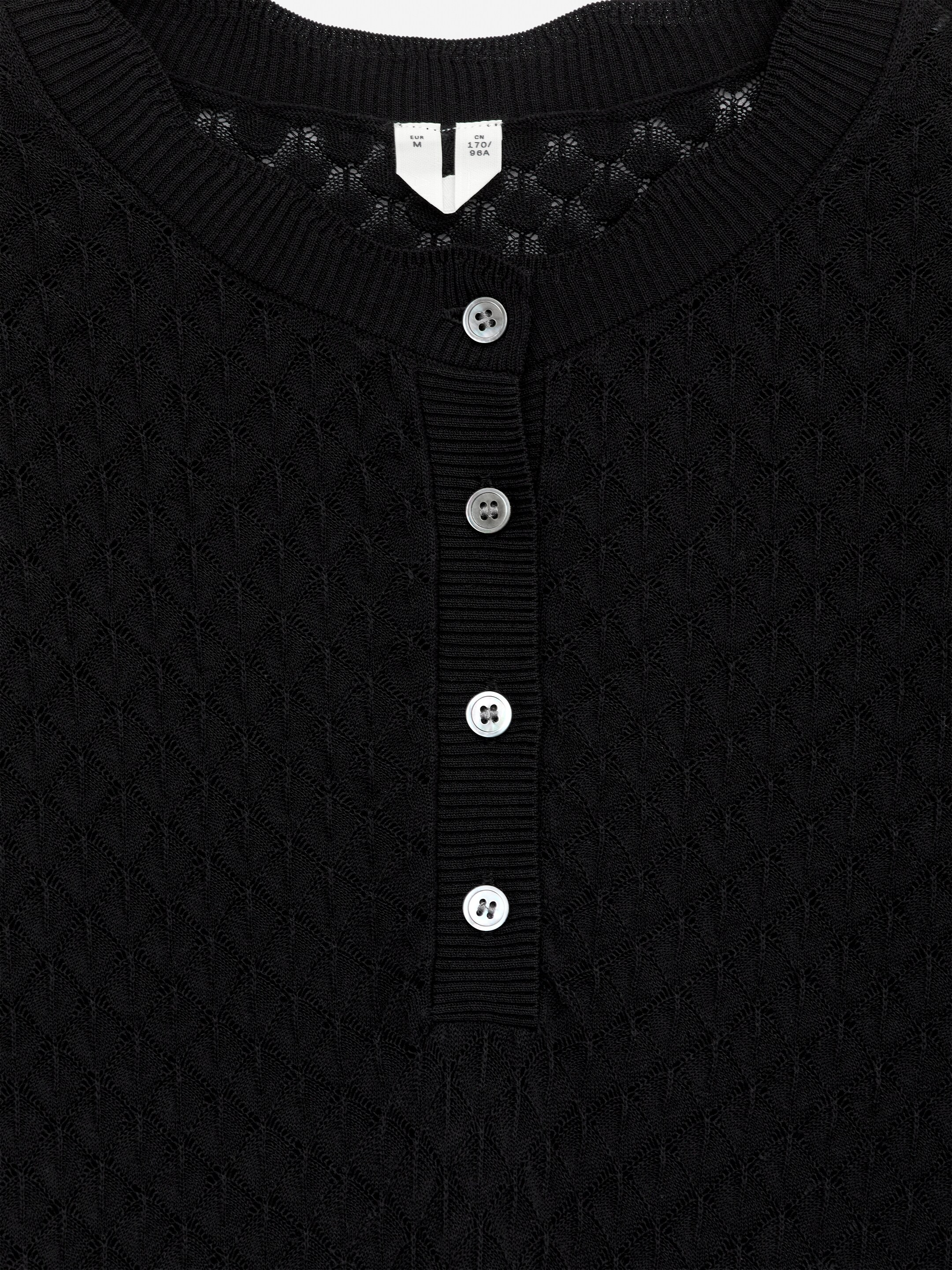 Näytä suurempi kuva: Reikäneulemekko - Musta - NAISET | H&M FI 2