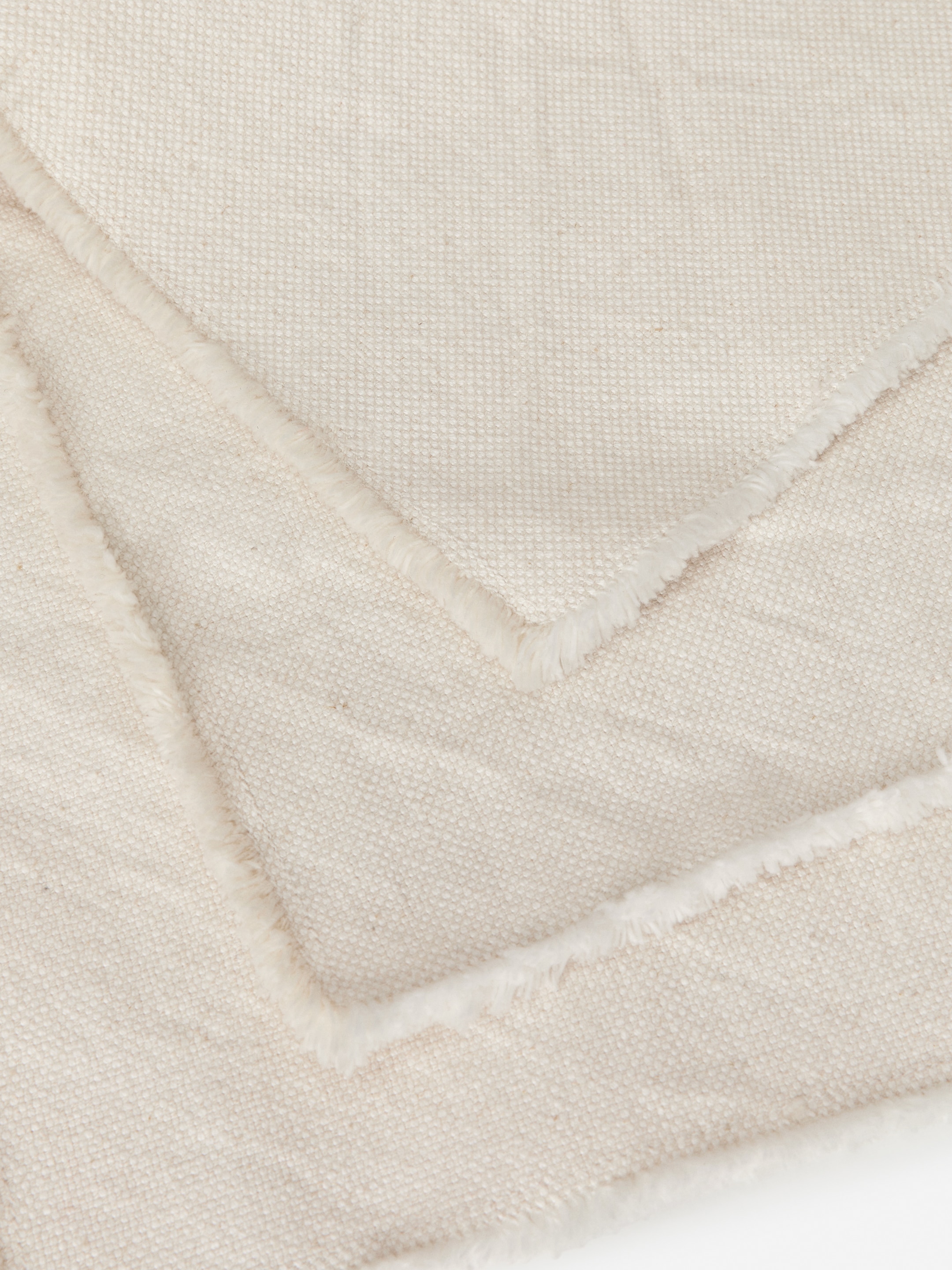 Grösseres Bild ansehen: Tischset mit ausgefransten Rändern, 2er-Set - Cremeweiß - HOME | H&M CH 2