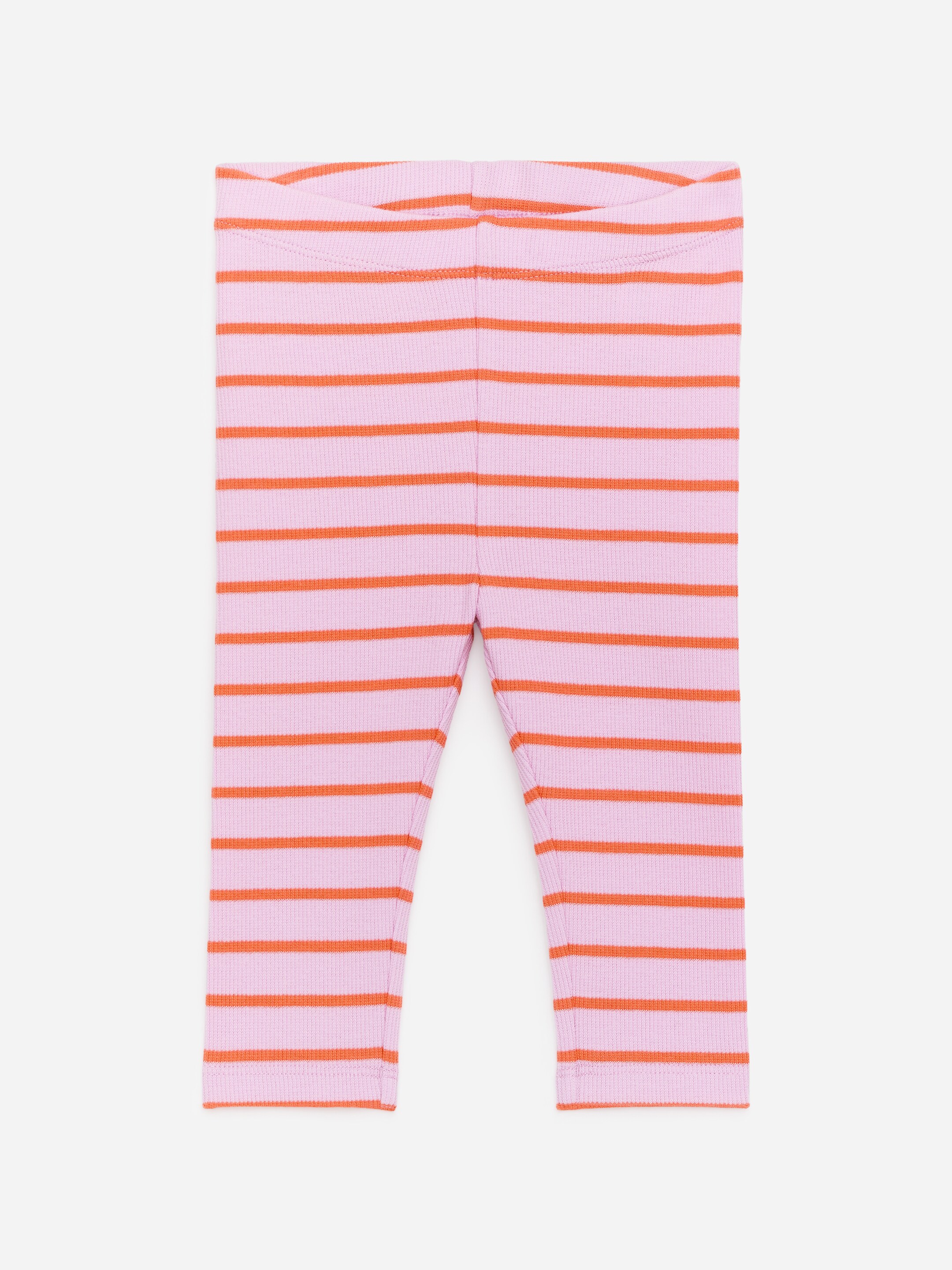 View larger image: Rib-knitted leggings are presented in a front view, featuring horizontal orange stripes on a light pink background. The waist features a neatly finished, folded waistband, and the leg openings are also hemmed.