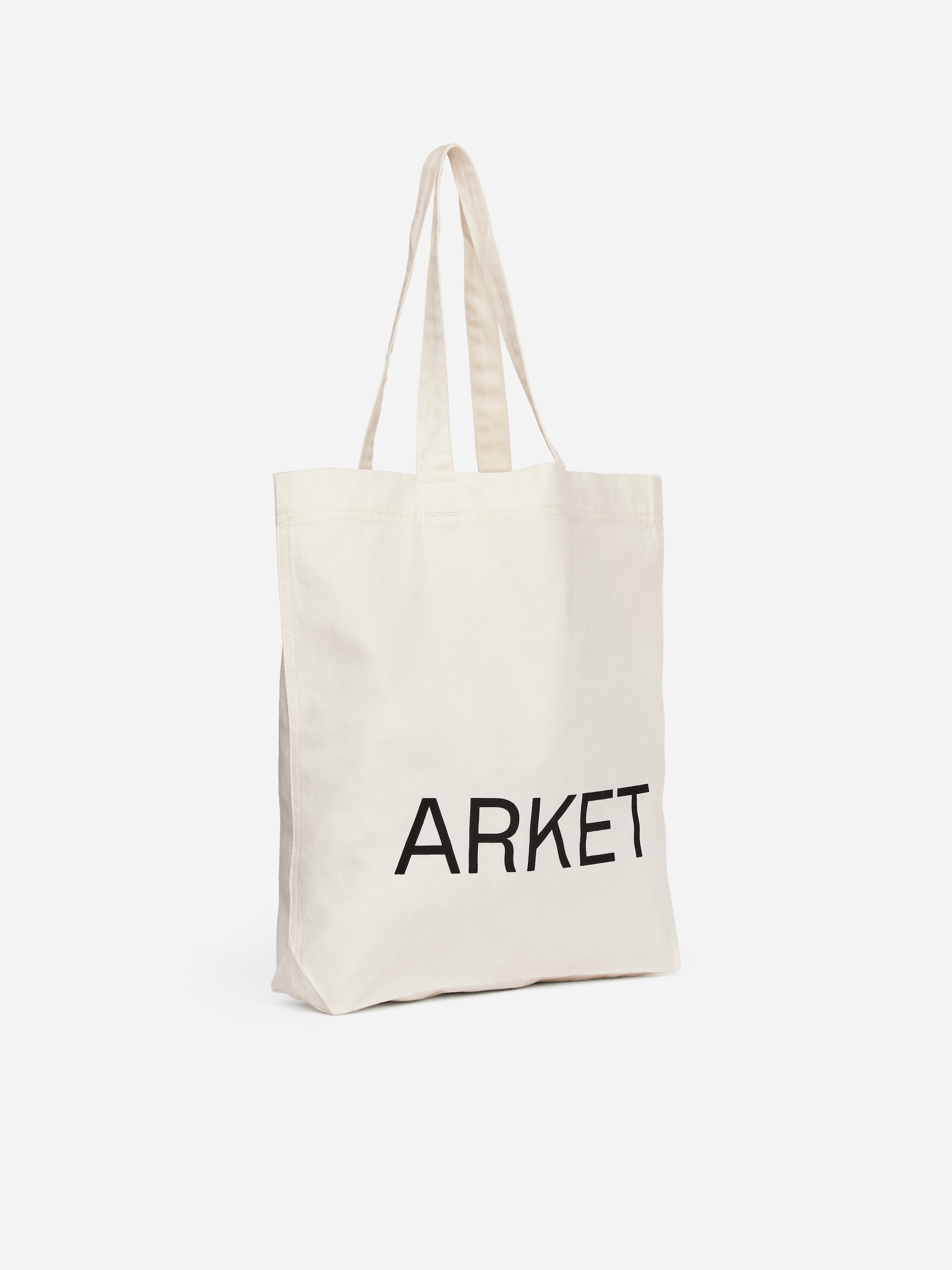 Visa större bild: ARKET toteväska i canvas - Off-white - HERR | H&M SE 4