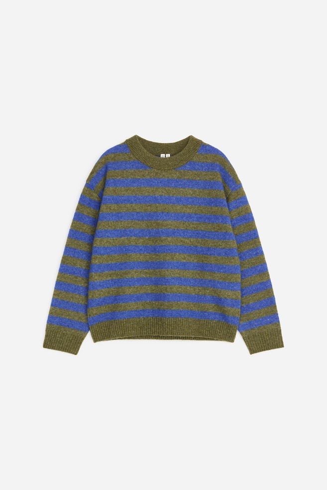 A jumper is displaying a front view, featuring broad horizontal stripes in olive green and royal blue. It is designed with a crew neck and is finished with ribbed cuffs and a ribbed hem. - 1