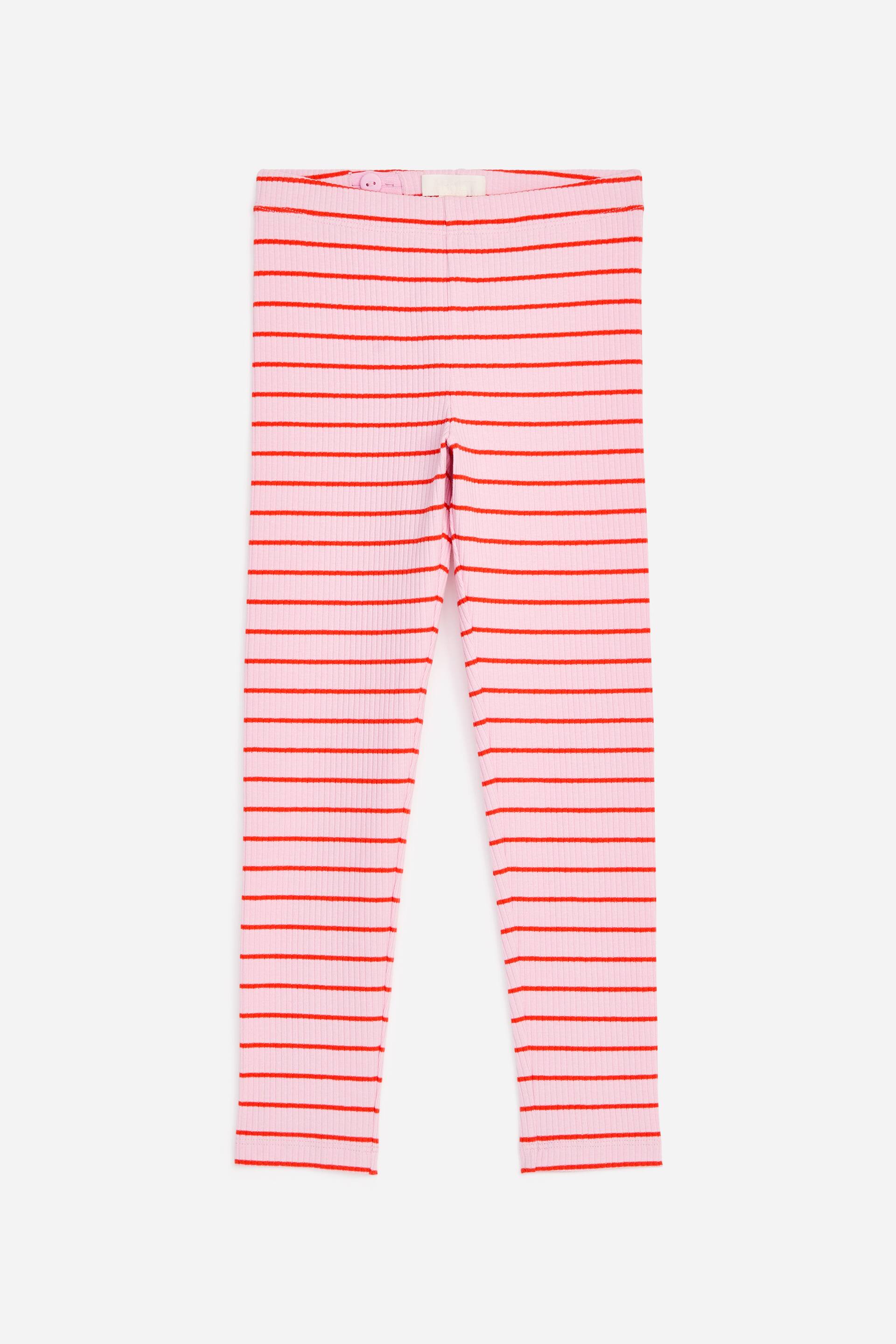 Visualizza immagine più grande: I leggings sono presentati frontalmente, mostrando una texture a coste con strisce orizzontali alternate in rosa e rosso. La vita elasticizzata presenta elastici regolabili visibili.