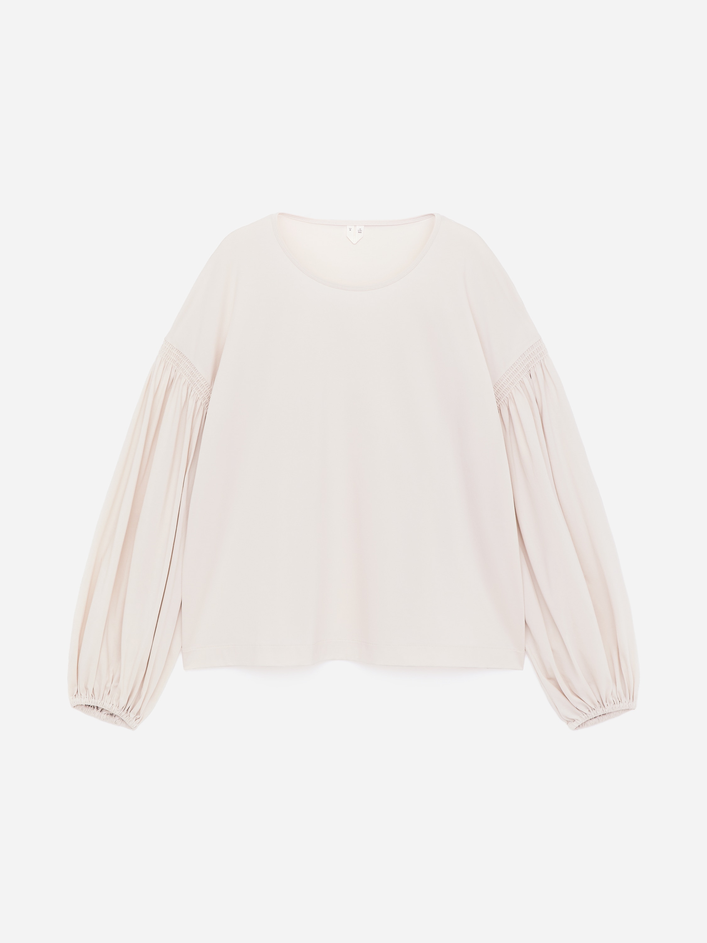 Blus i bomull, med ballongärmar. - Ljus mullvad/Svart