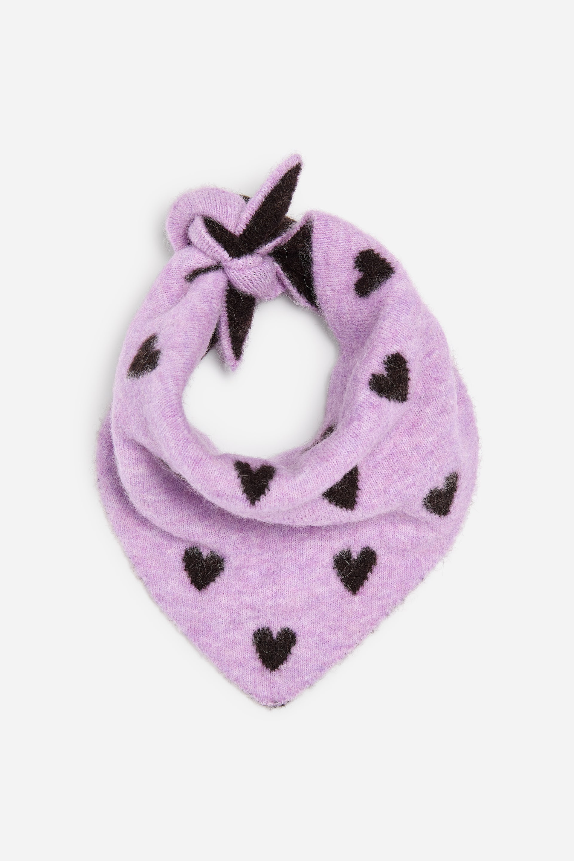 View larger image: A knitted light purple bandana featuring dark brown heart patterns. It is tied at the top, forming a triangular shape.