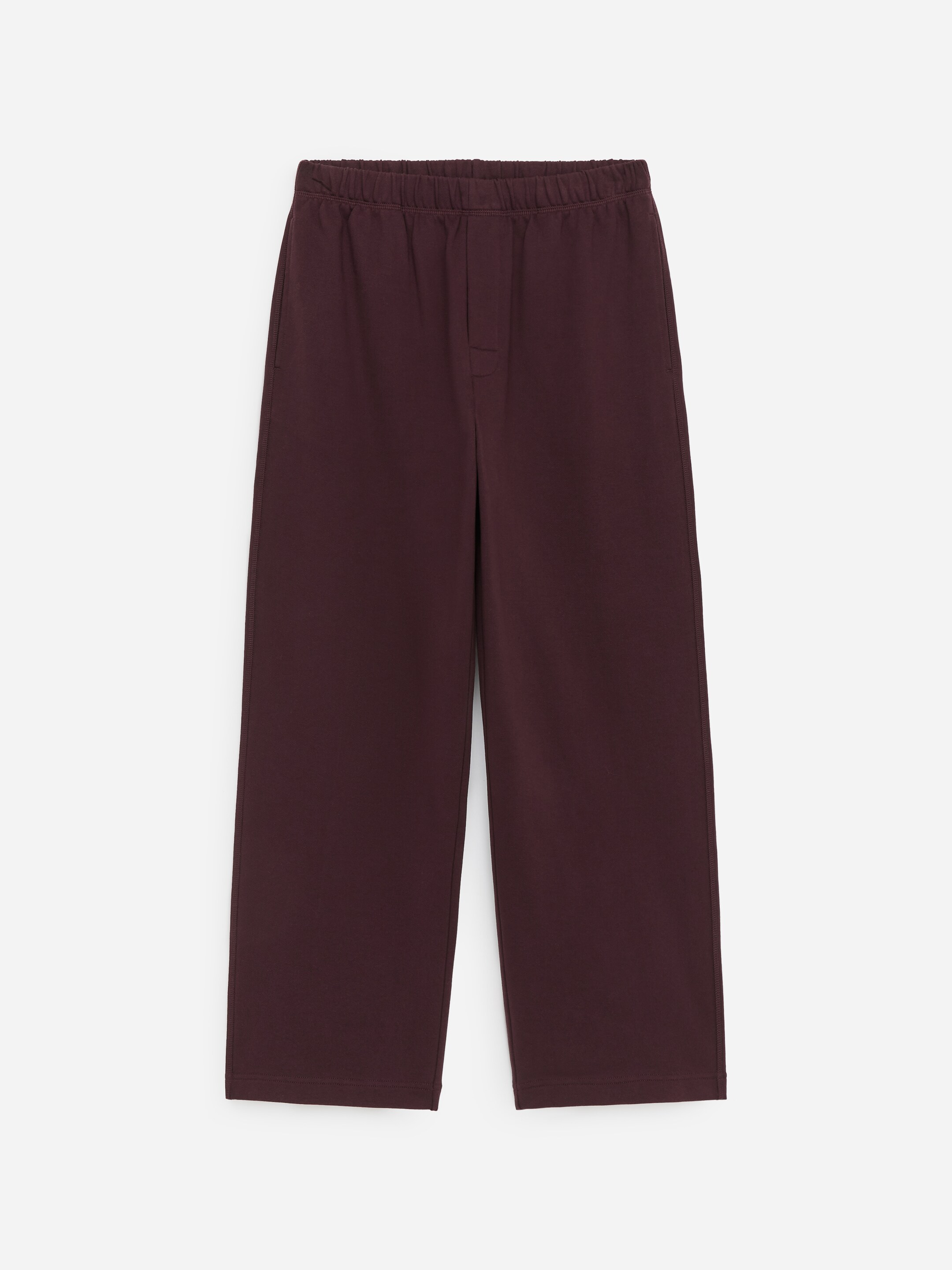 View larger image: FRONT view of maroon sweatpants featuring an elasticated waistband and vertical side pockets.