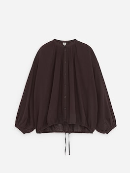 Blus med dragsko