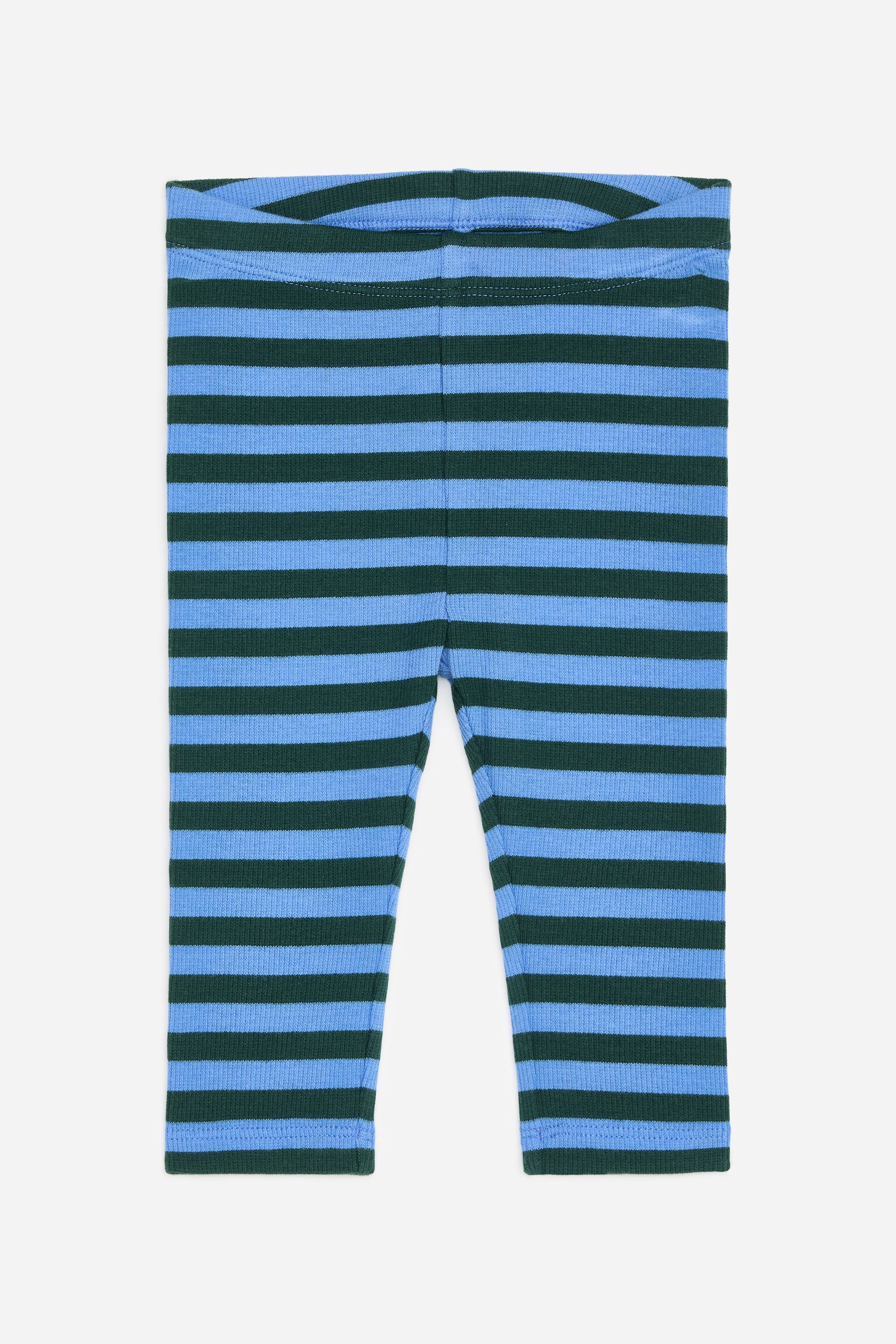 Visa större bild: Ribbstickade leggings, tillverkade av ett bomullsjerseymaterial, visas platt i en framifrånvy. De har alternerande horisontella ränder i mörkgrönt och ljusblått, och inkluderar en midjeband med justerbara elastiska band.