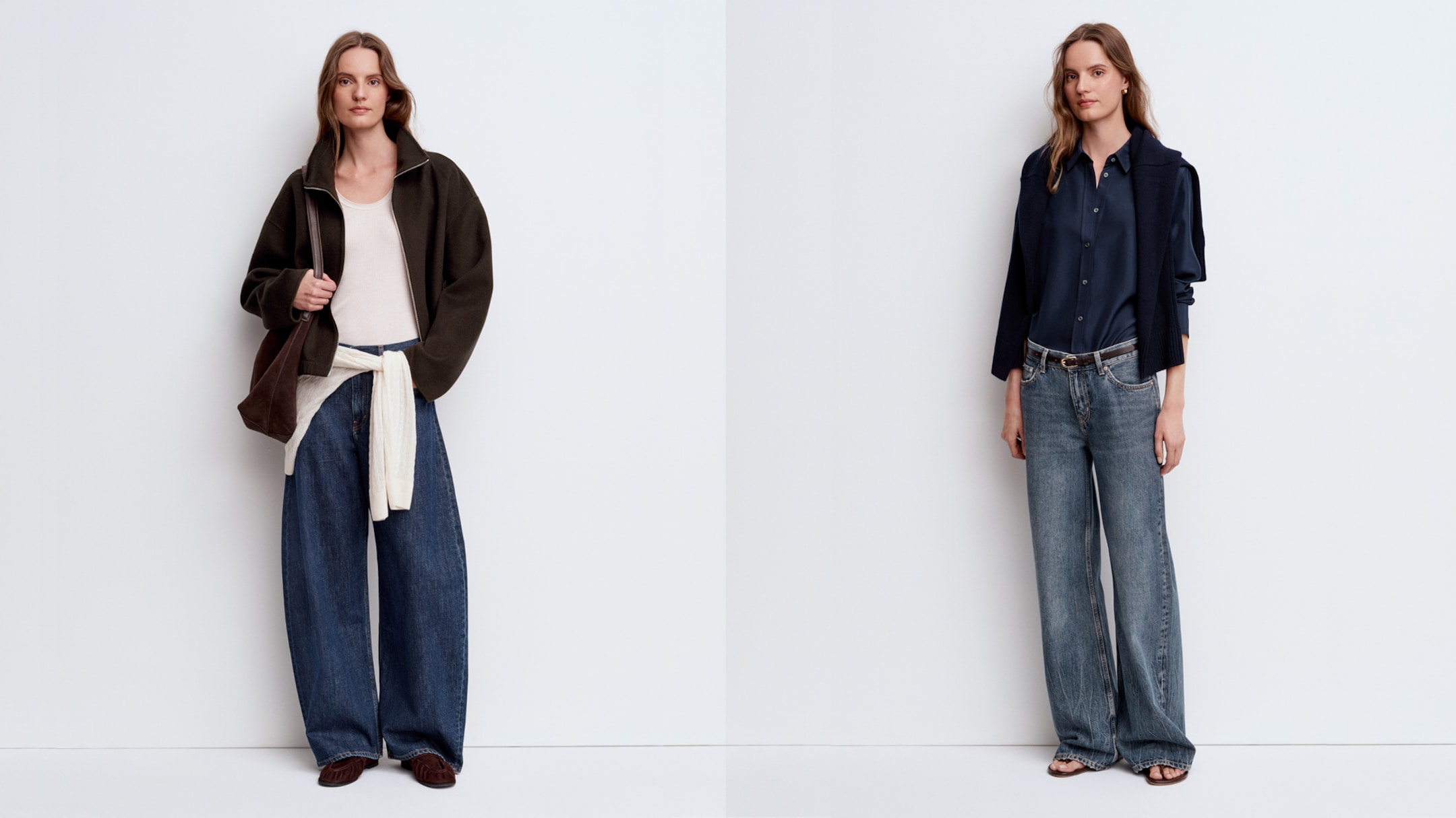 Two women in casual outfits stand against a white background. One wears a dark jacket and wide jeans; the other wears a dark shirt with light jeans.