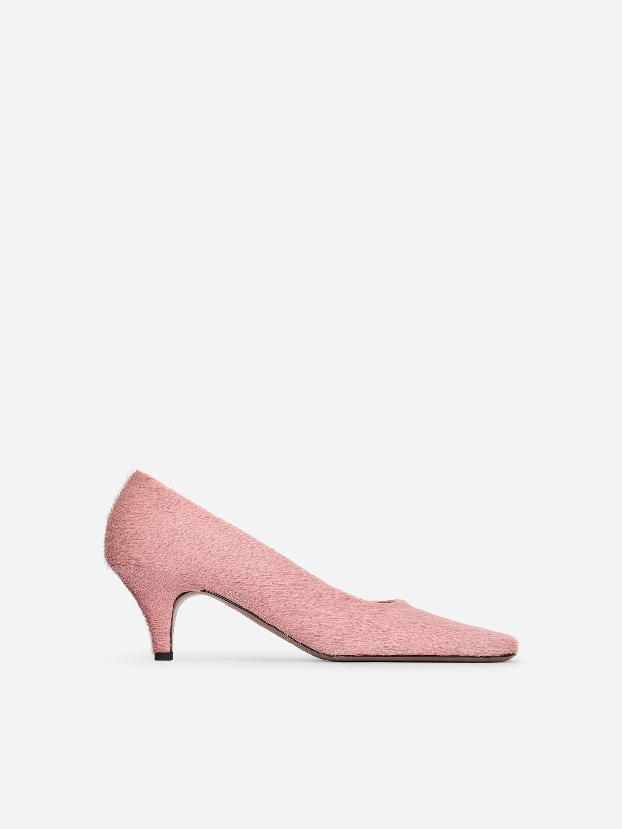 Side view of a pink faux-fur kitten-heel pump on a white background.