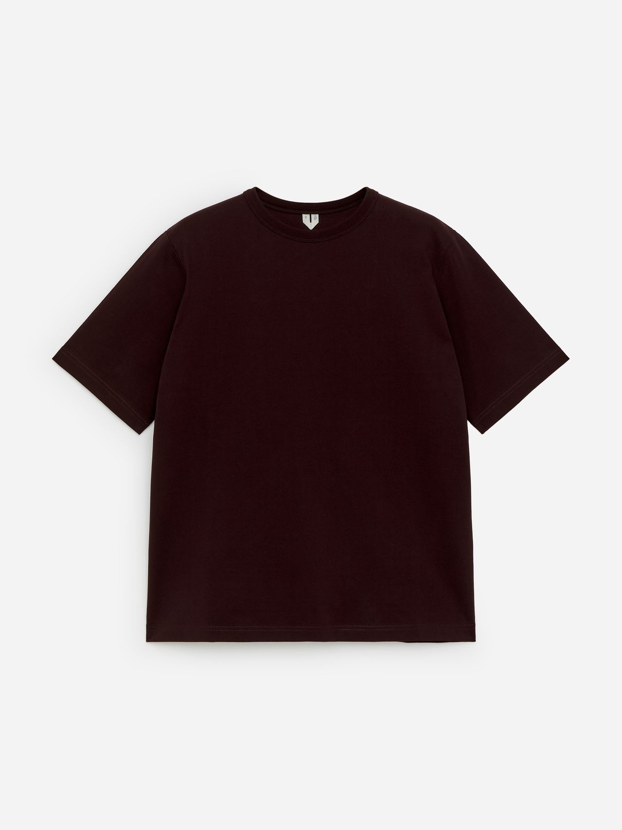 A plain black T-shirt on a white background, featuring short sleeves and a round neckline.