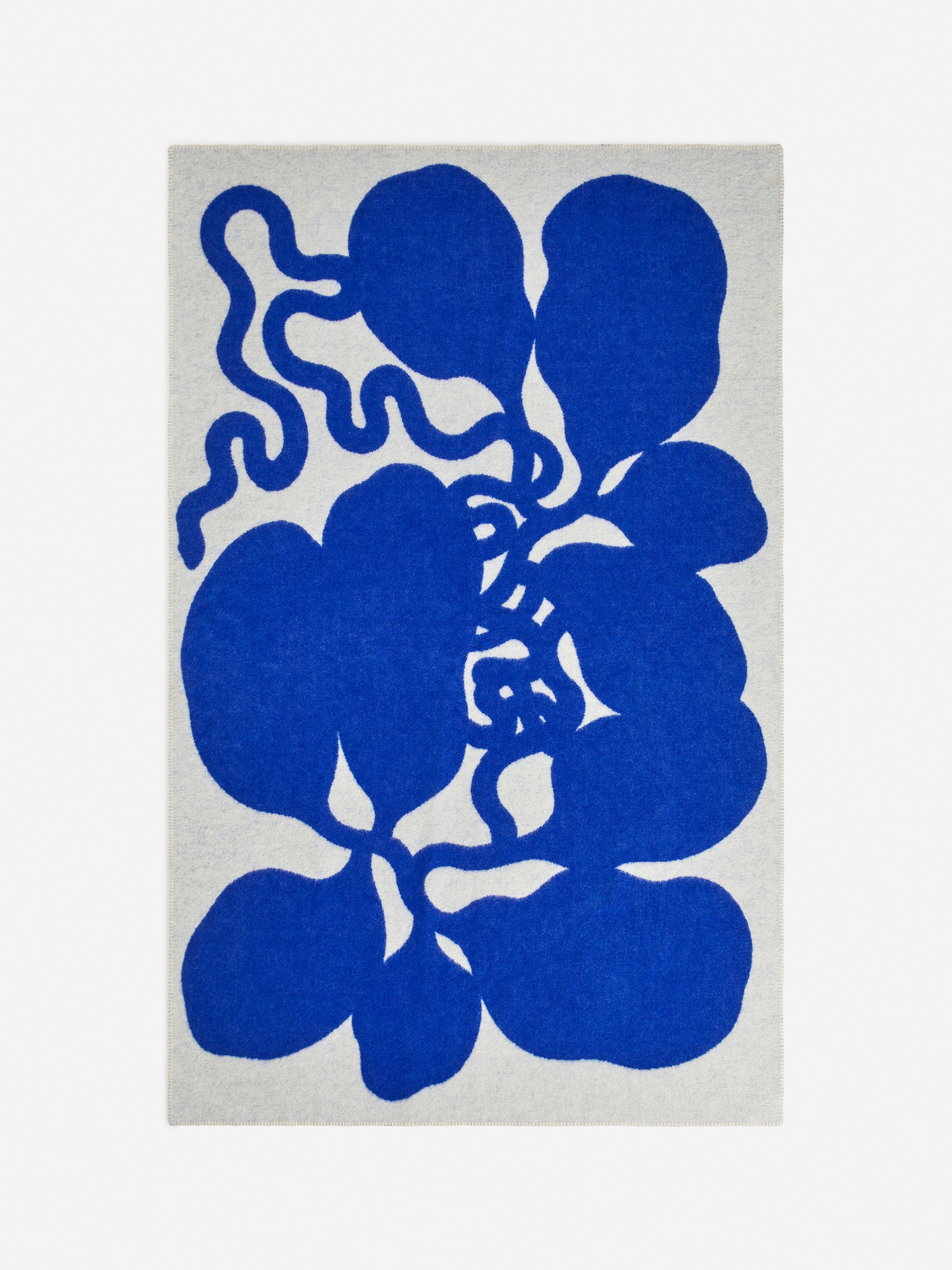 A white background with bold, abstract blue shapes resembling leaves or organic forms connected by flowing lines.