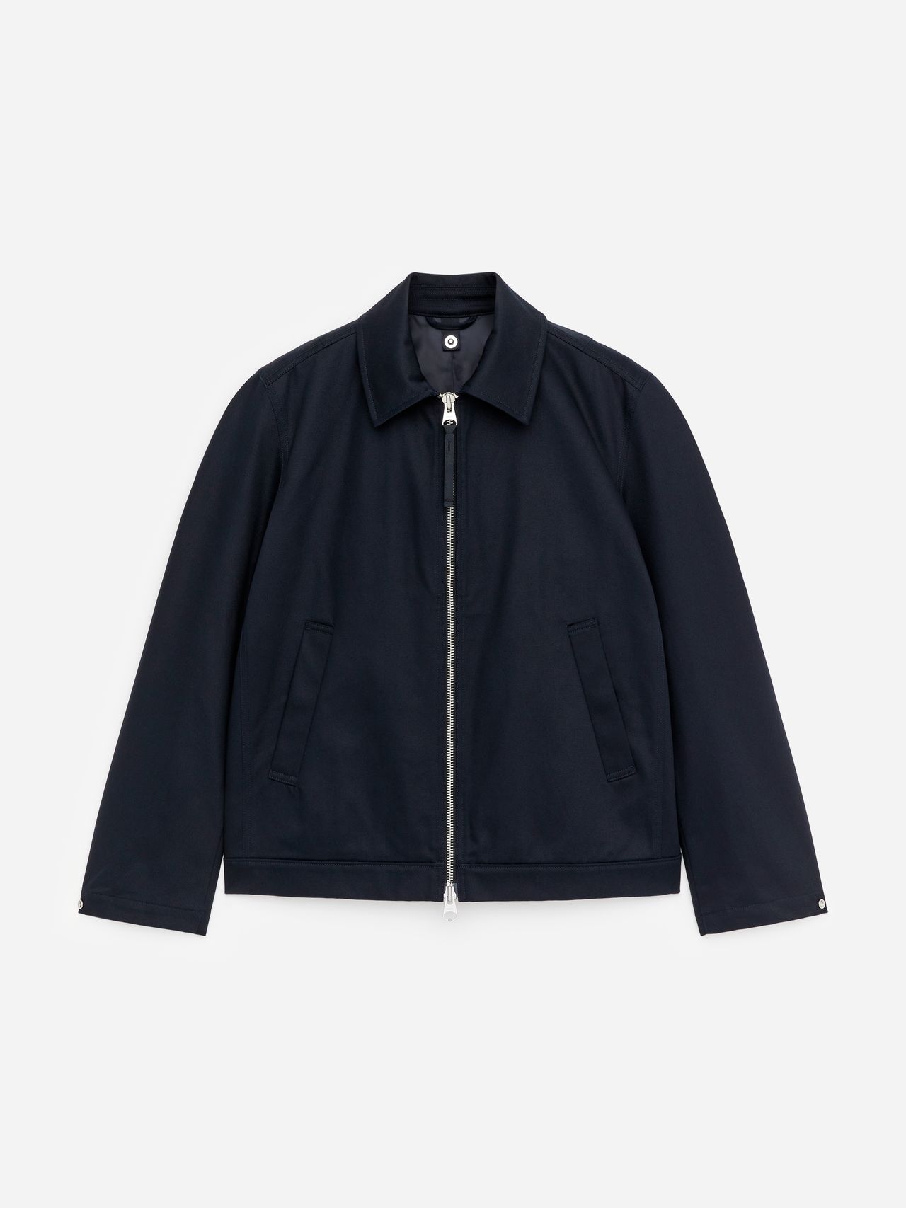 Navy blue zip-up jacket with a collar, two front pockets, and long sleeves, displayed on a white background.