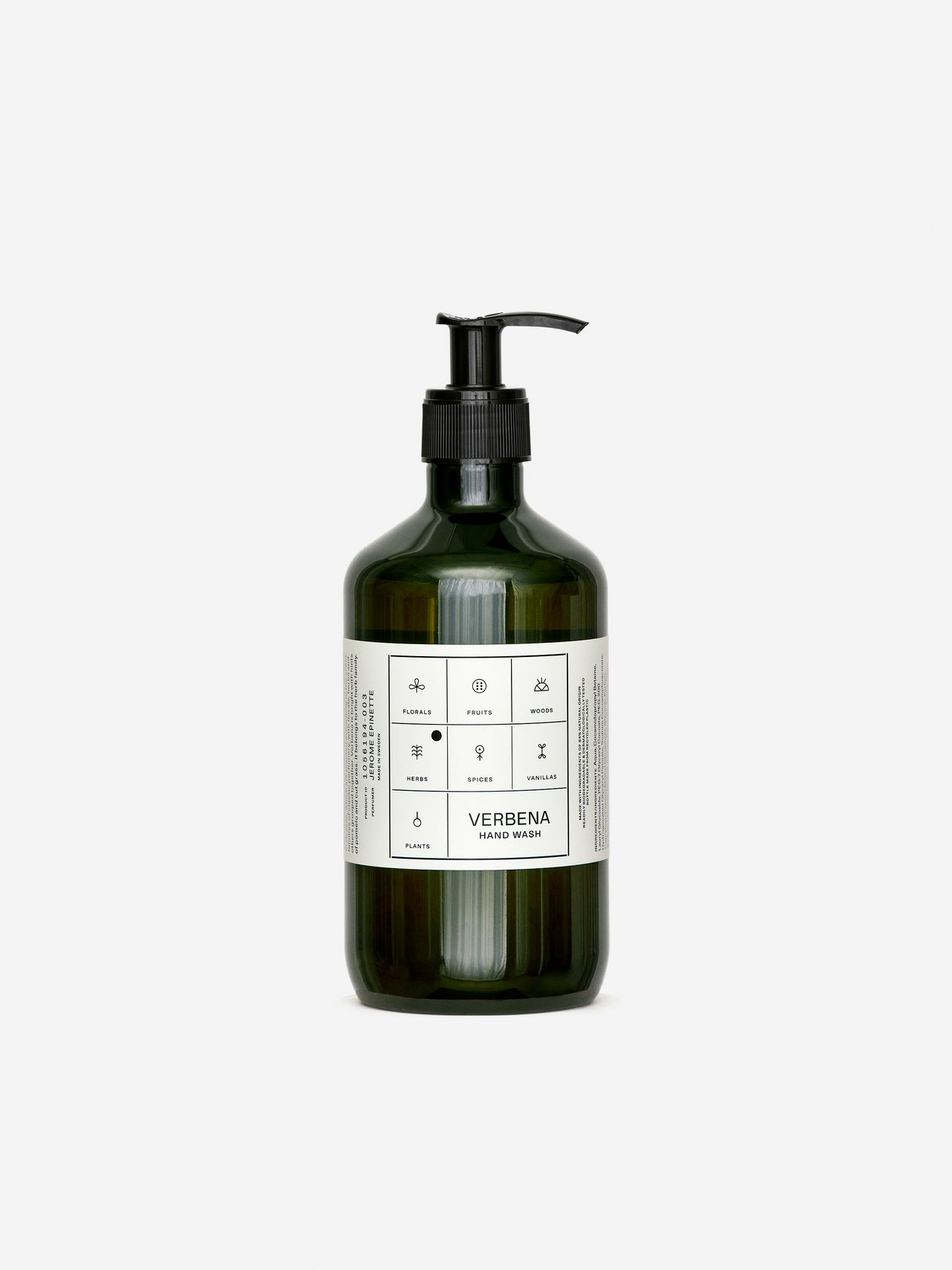 Green bottle of Verbena hand wash with pump dispenser, featuring a minimalist label with symbols and text, on a white background.