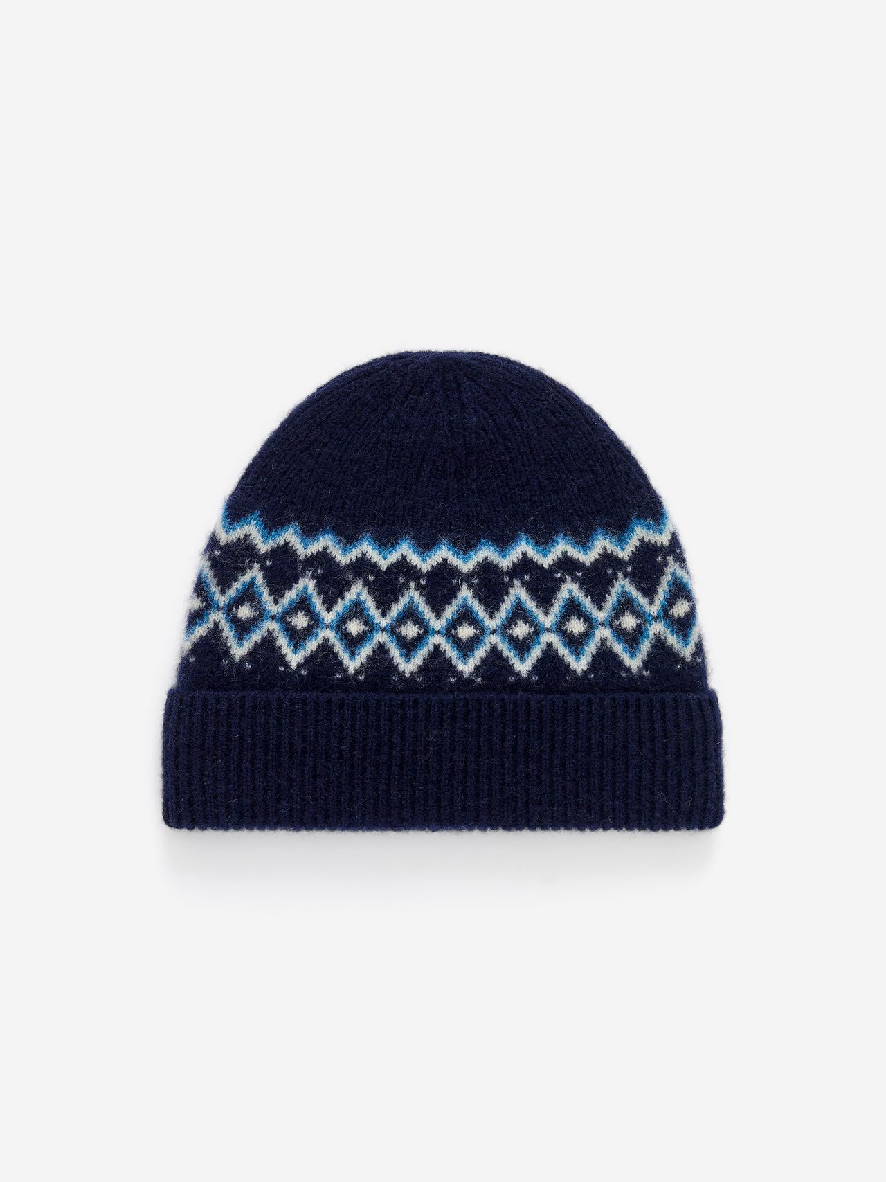 Navy knit beanie with folded cuff and white-and-light-blue Fair Isle diamond pattern band.
