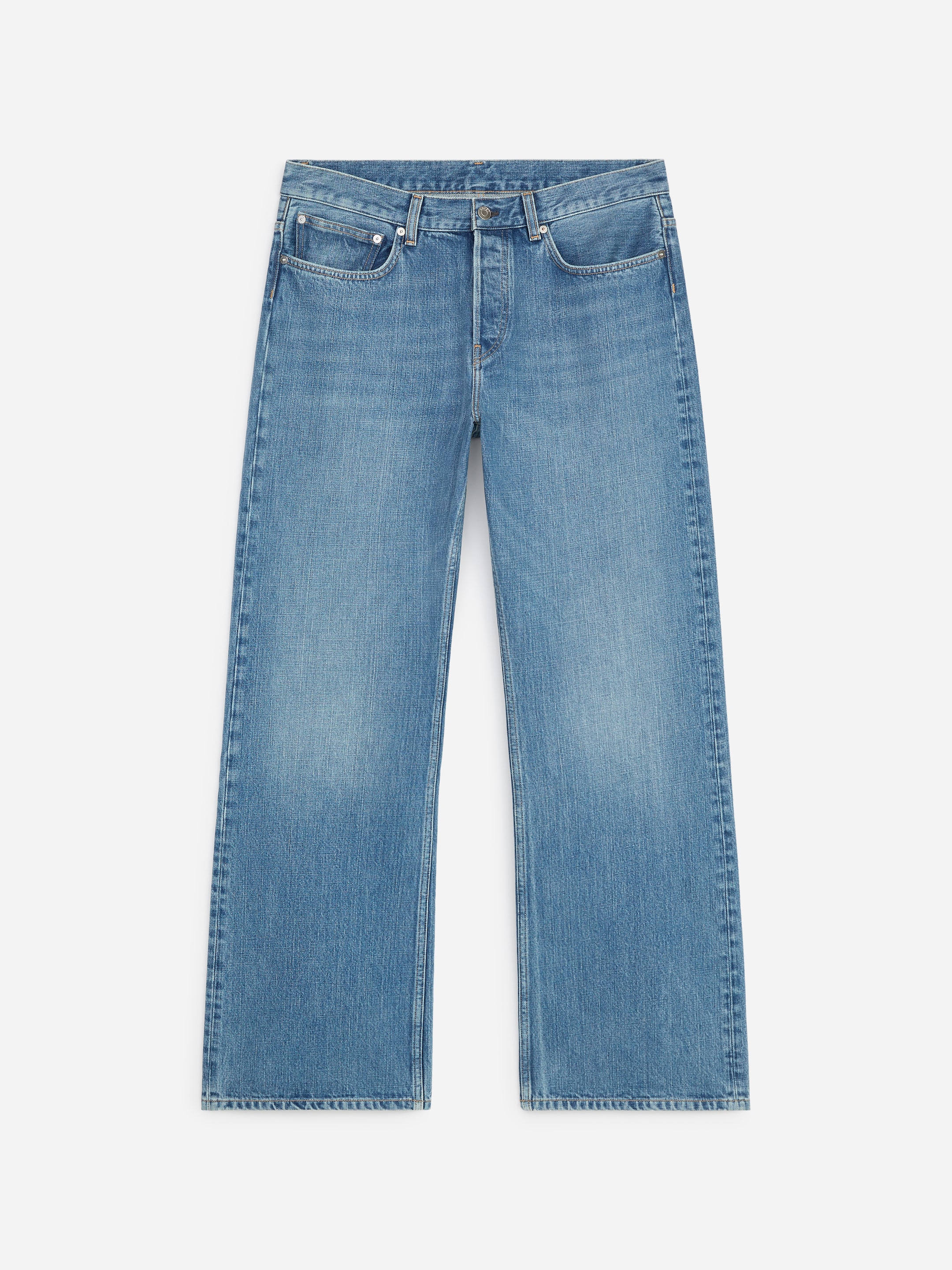 Wide-leg light blue jeans with a classic five-pocket design and a faded wash, laid flat on a white background.