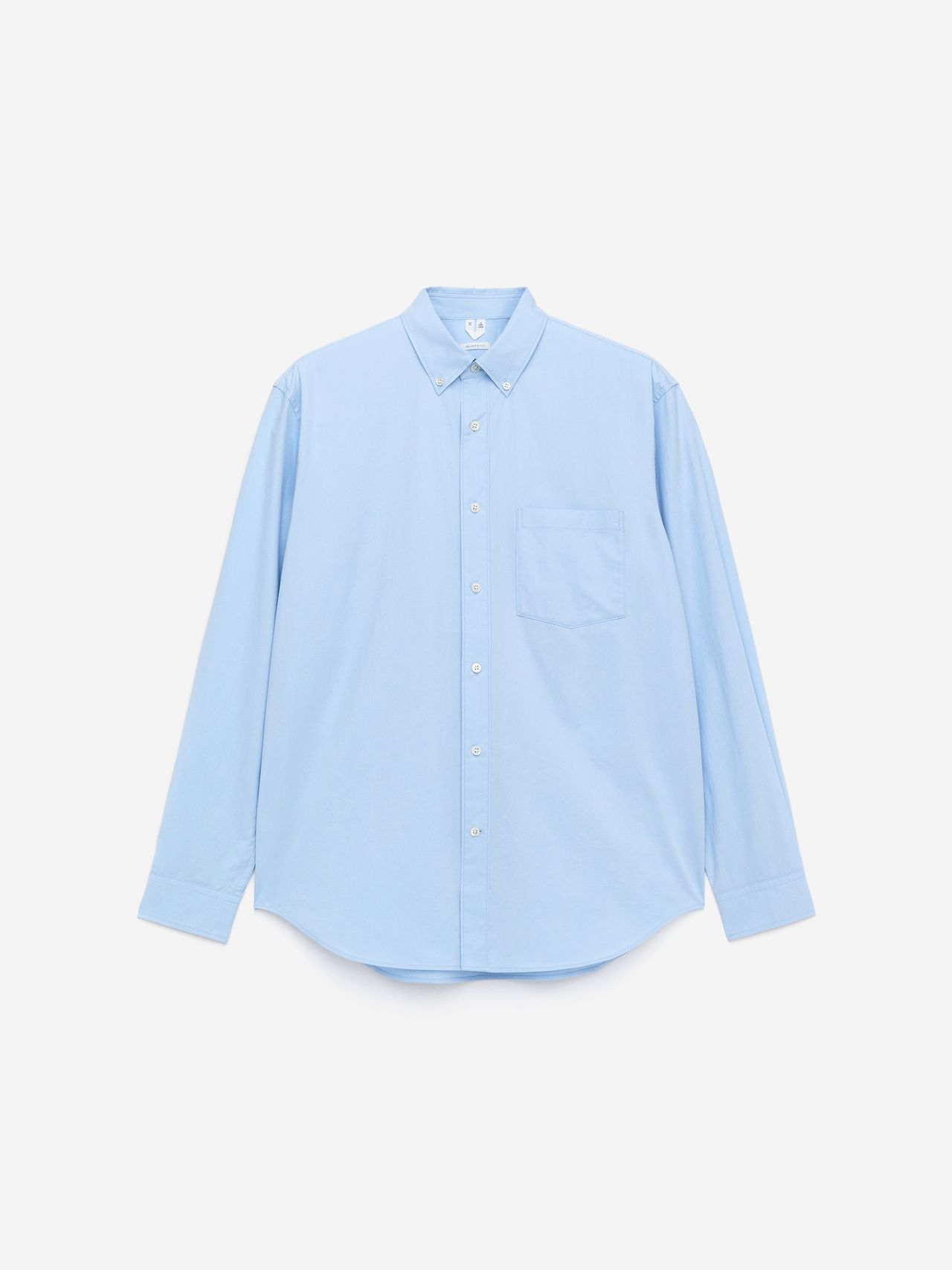Light blue long-sleeve button-up shirt with a chest pocket, displayed on a white background.