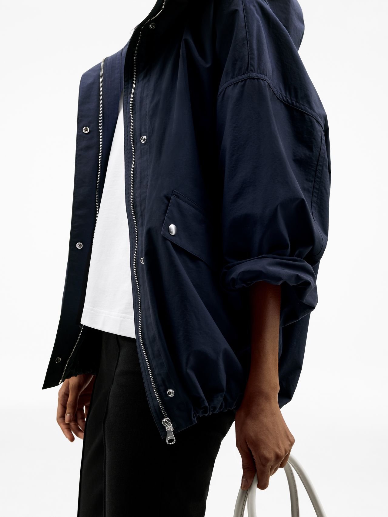 Close up, woman in dark blue jacket