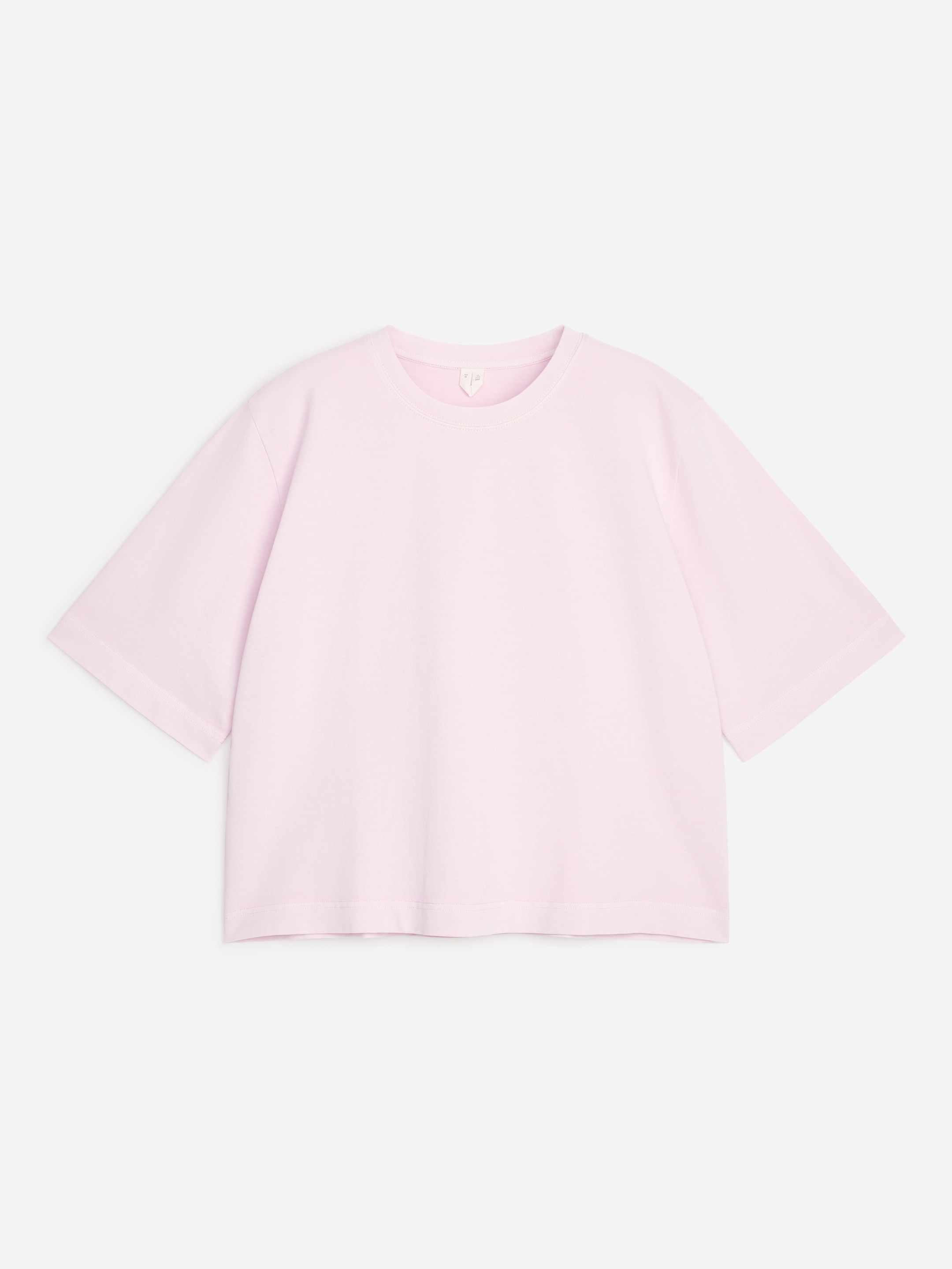 Light pink short-sleeve T-shirt with a round neckline, displayed on a white background.