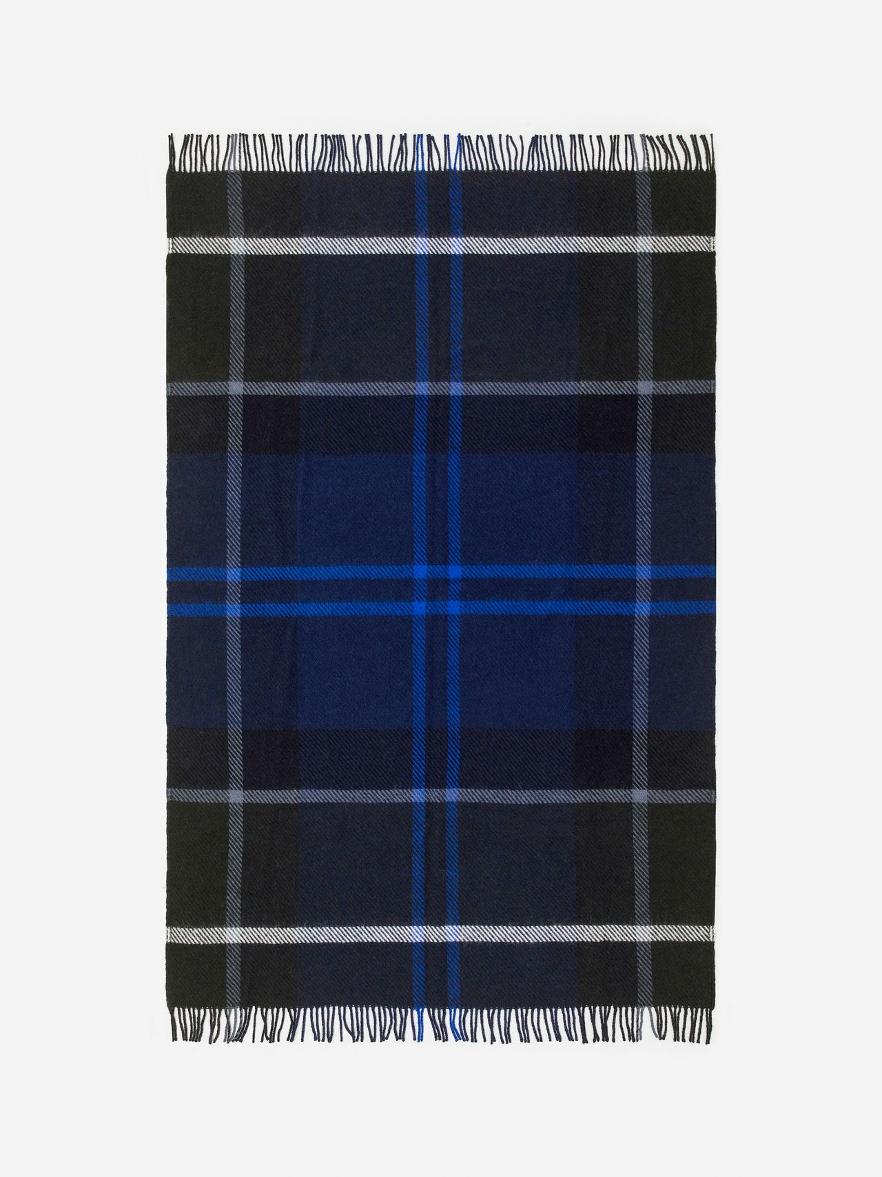 Blue and black plaid blanket with white accents, featuring fringed edges, laid flat on a white background.