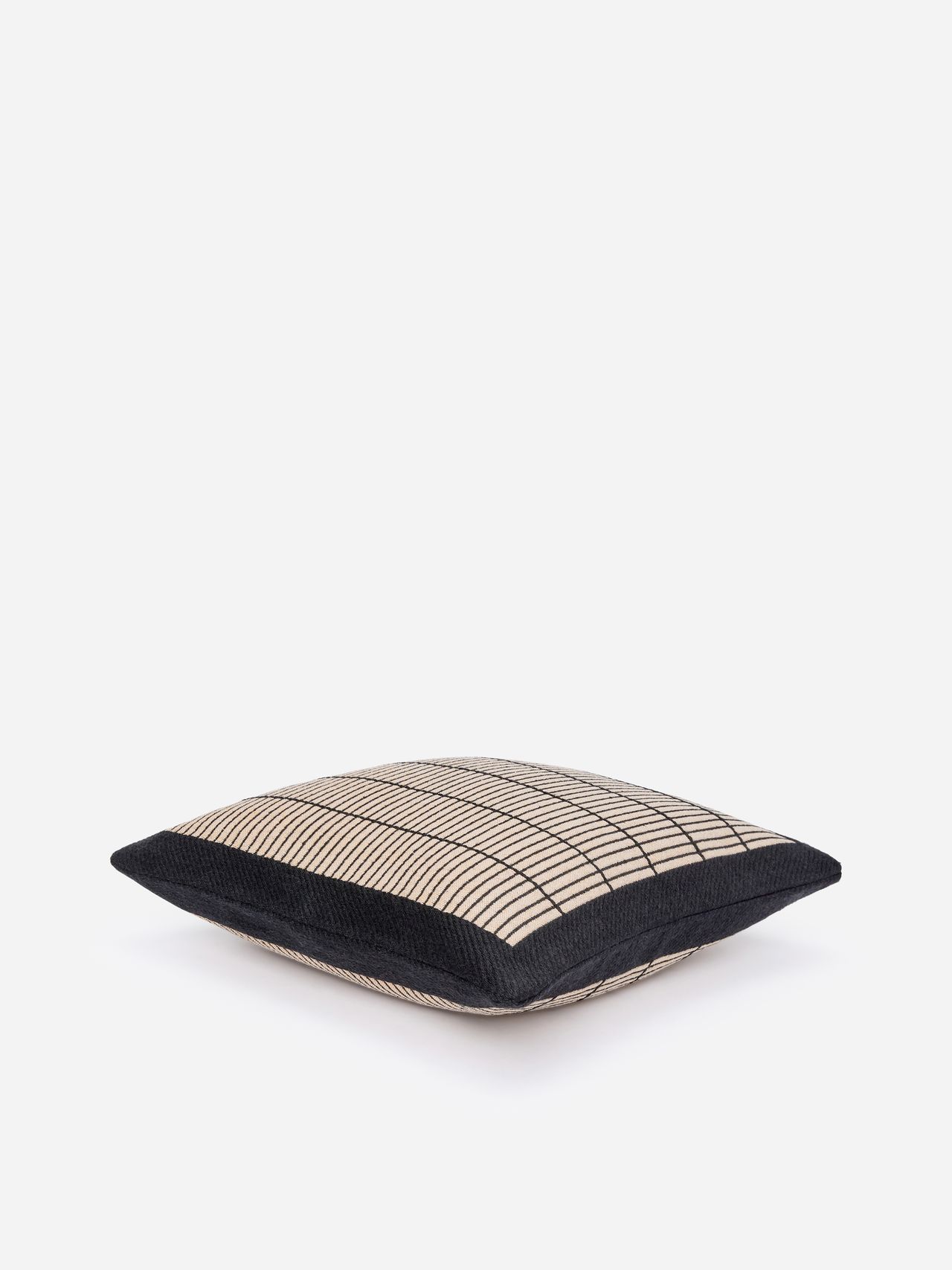 Square cushion with a black and beige grid pattern, featuring a black border, on a white background.