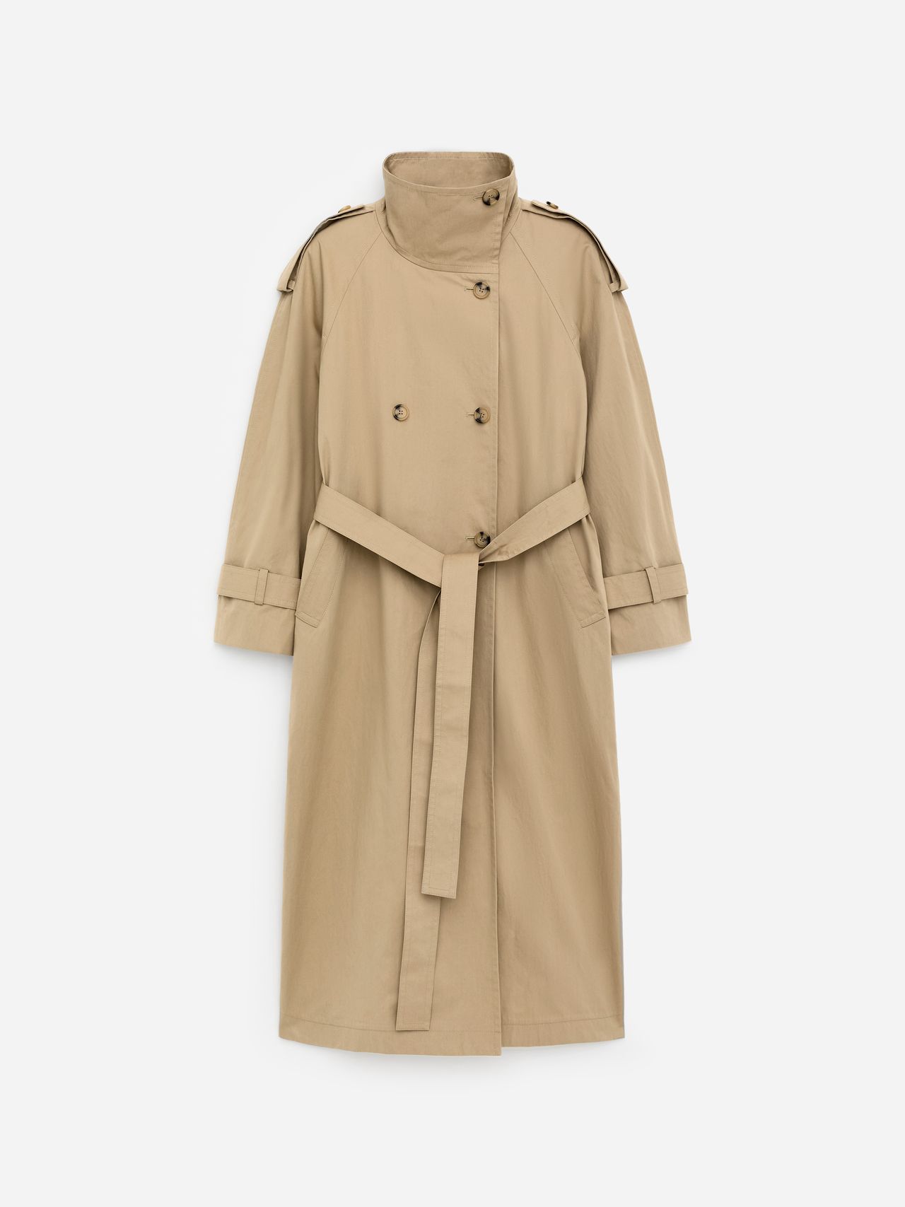 Long beige double-breasted trench coat with high collar, shoulder epaulettes and waist belt on white background.