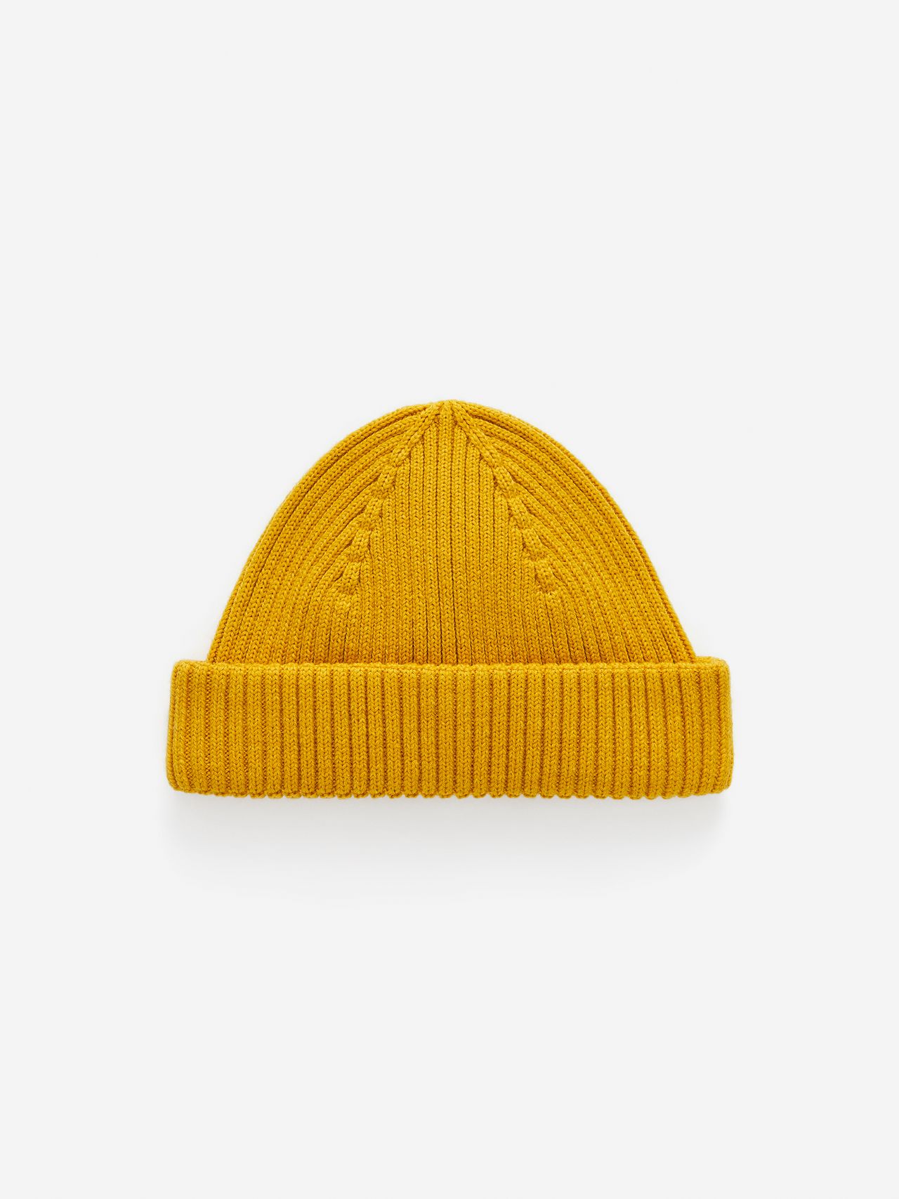Yellow knit beanie with a folded brim and ribbed texture, displayed on a plain white background.