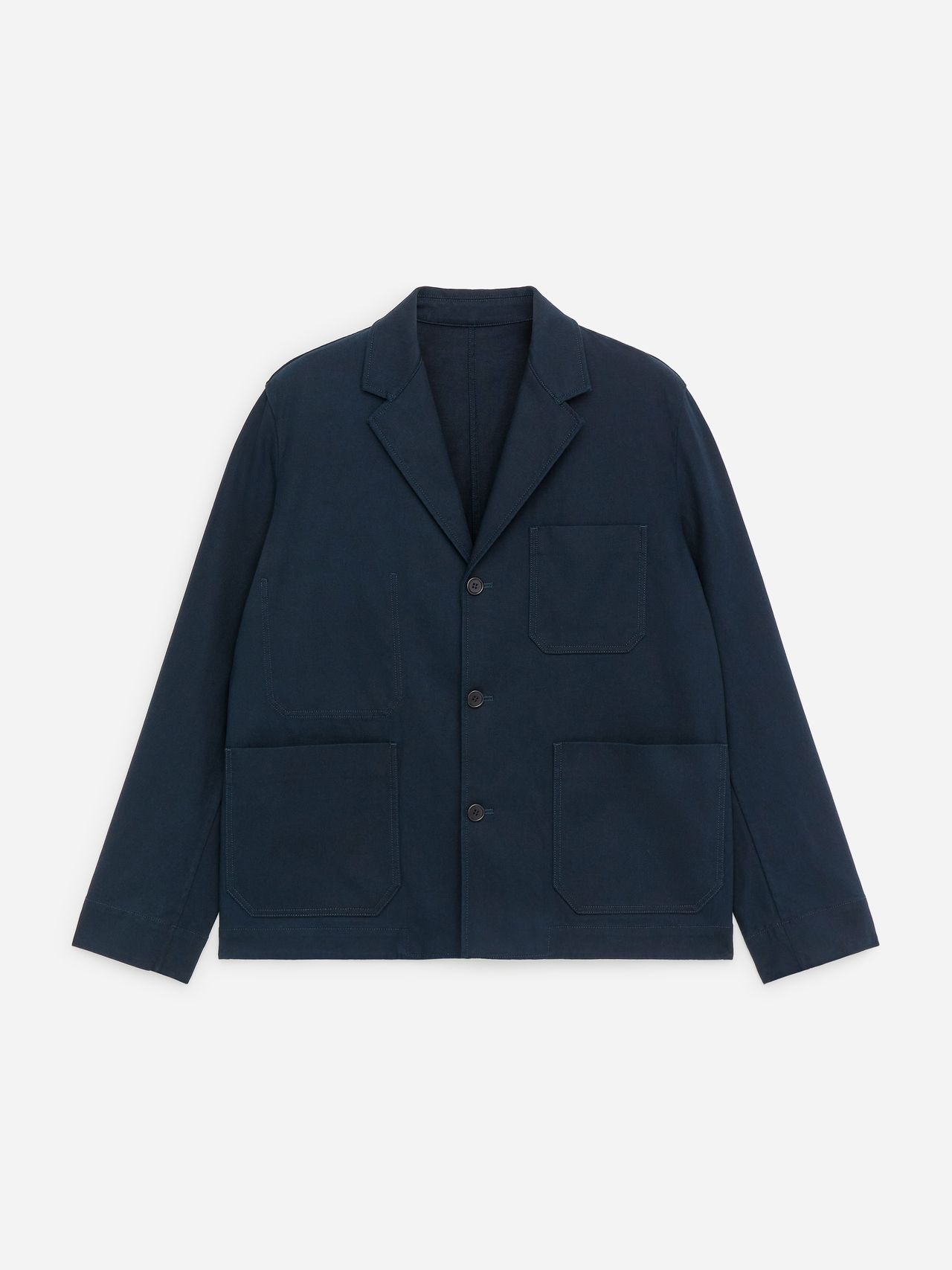 Navy blue buttoned work jacket with three front pockets, laid flat on a white background.