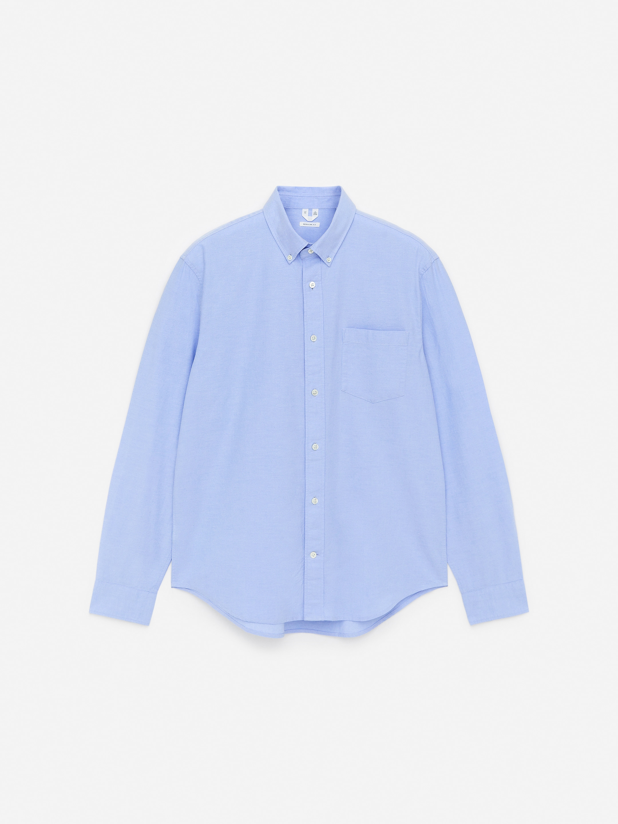 Light blue long-sleeve button-up shirt with a chest pocket and a spread collar, displayed on a white background.