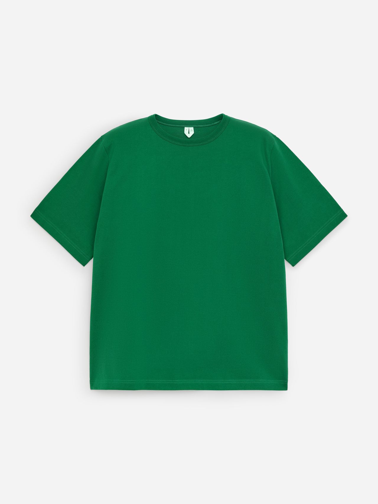 A plain emerald green T-shirt on a white background, featuring short sleeves and a round neckline.